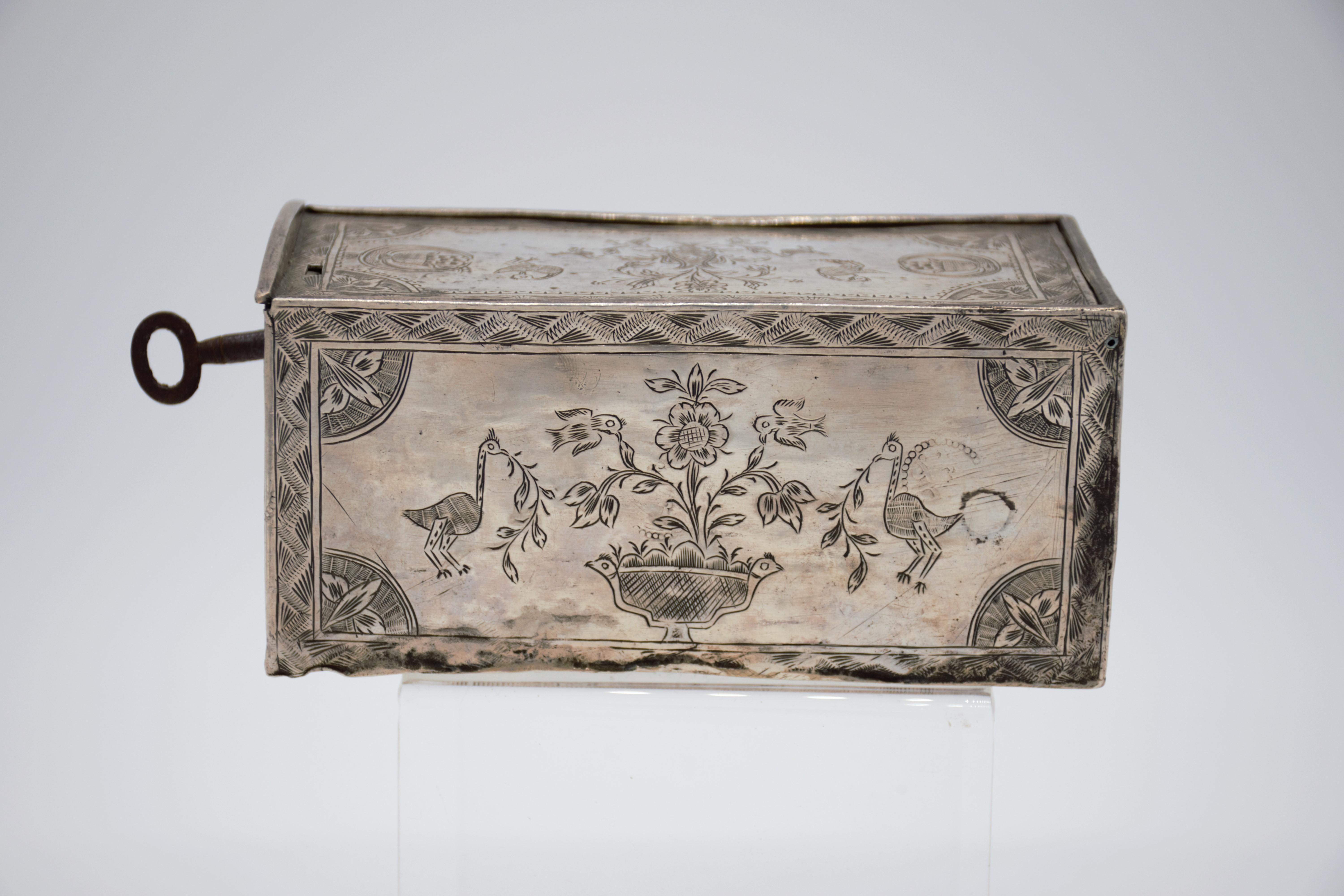 
Amazing and scarce JUDAICA object, we have here one of the most touching jewish objects we had for a long time, this small silver dowry box was made in Algeria in the early 19th century, it is all covered with symbols of jewish faith and of