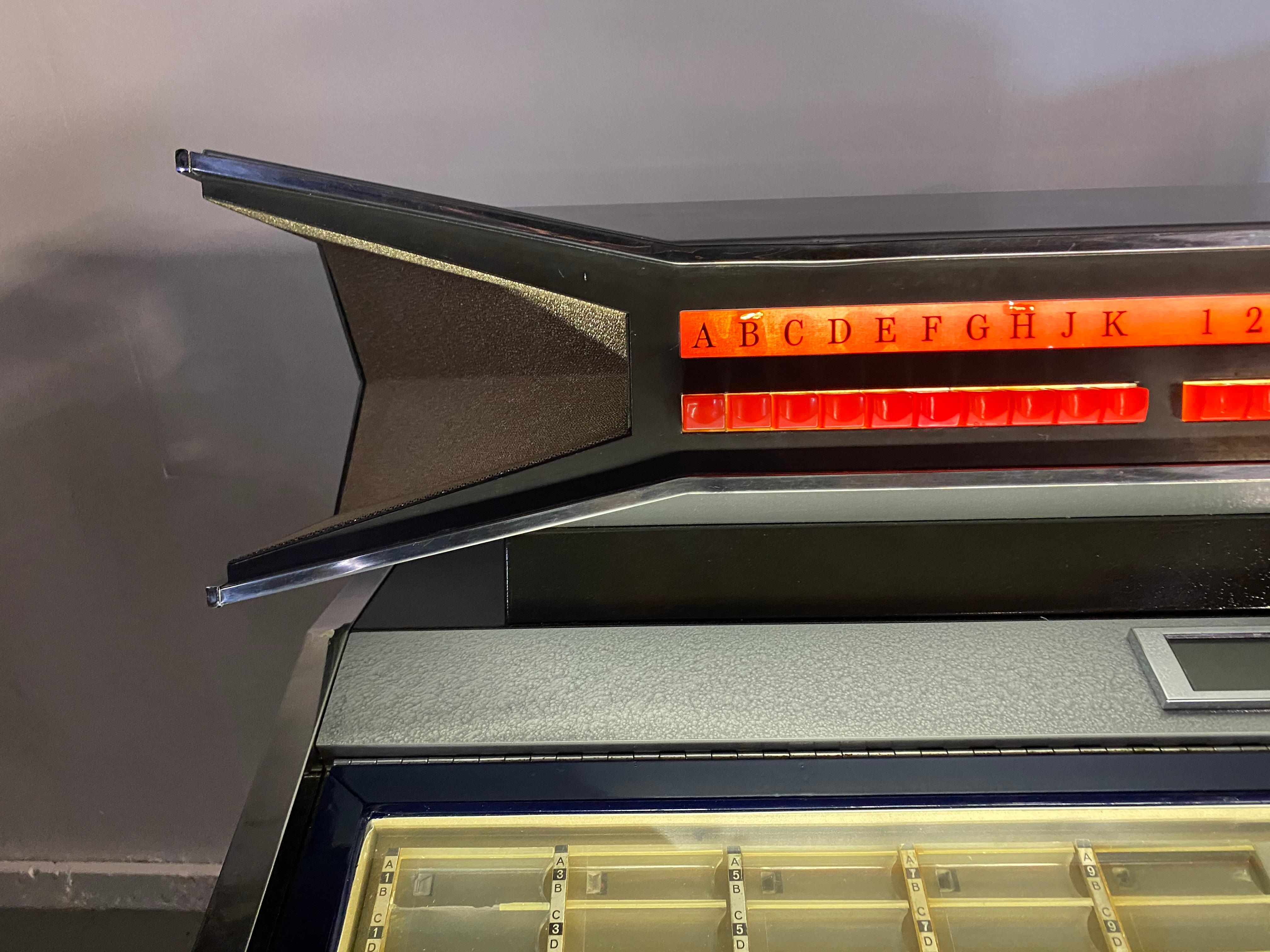 Extremely rare AMI / Rowe CMM1 Cadette Jukebox., Modernist, Jetsons Design, c 1969, fully restored, working perfectly, 25 cents, plays 3 selections, holds 50 records, amazing sound, great size, 32
