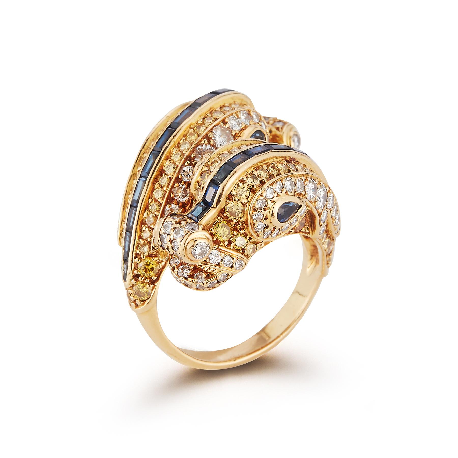 Extremely Rare and Iconic Fancy Yellow Diamond Chimeres Ring by Cartier

Cartier Chimera: 
Fascinated by the magic and the strange beauty of fantastical creatures, 
Cartier has regularly created Chimera jewelry since the 1920s. 
The renowned jeweler