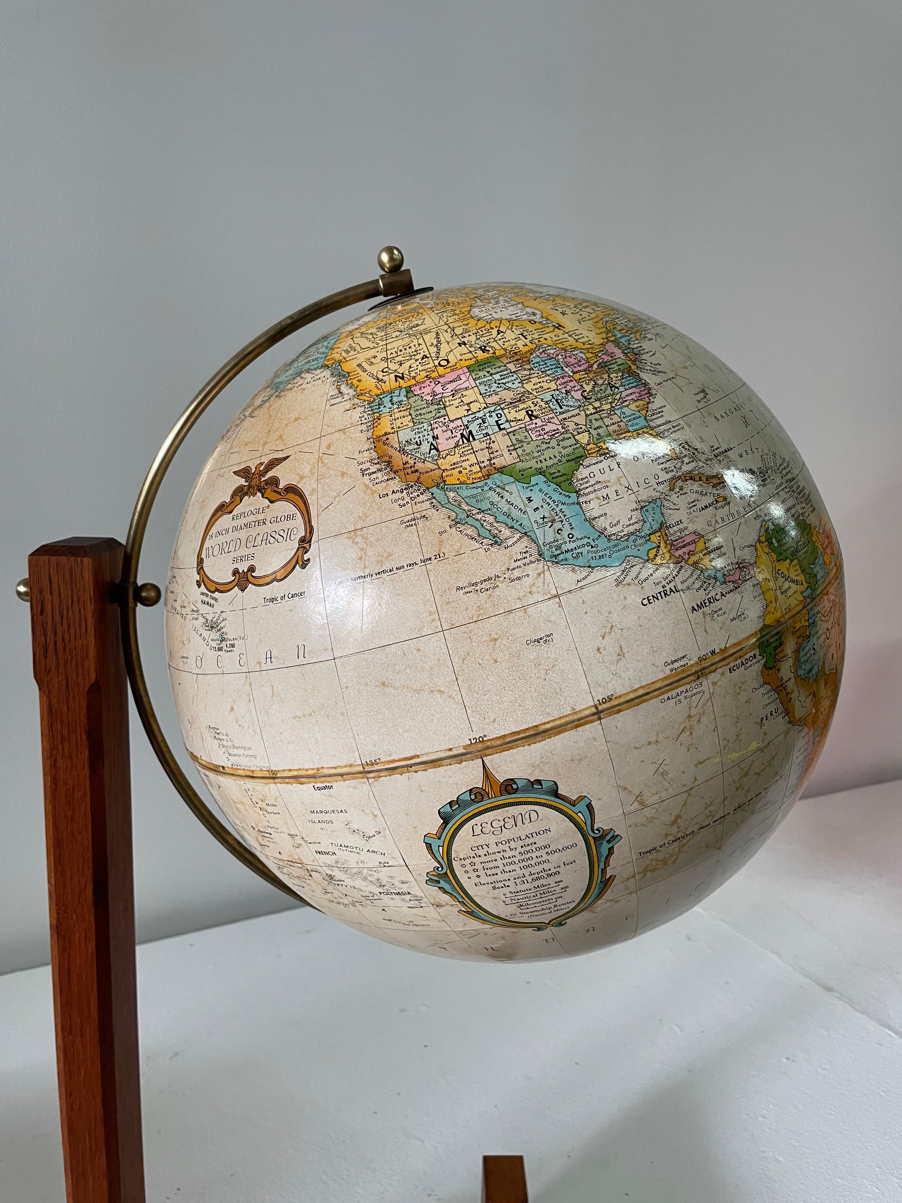 Extremely Rare Cantilevered Style Teak & Brass World Globe In Good Condition For Sale In East Hampton, NY