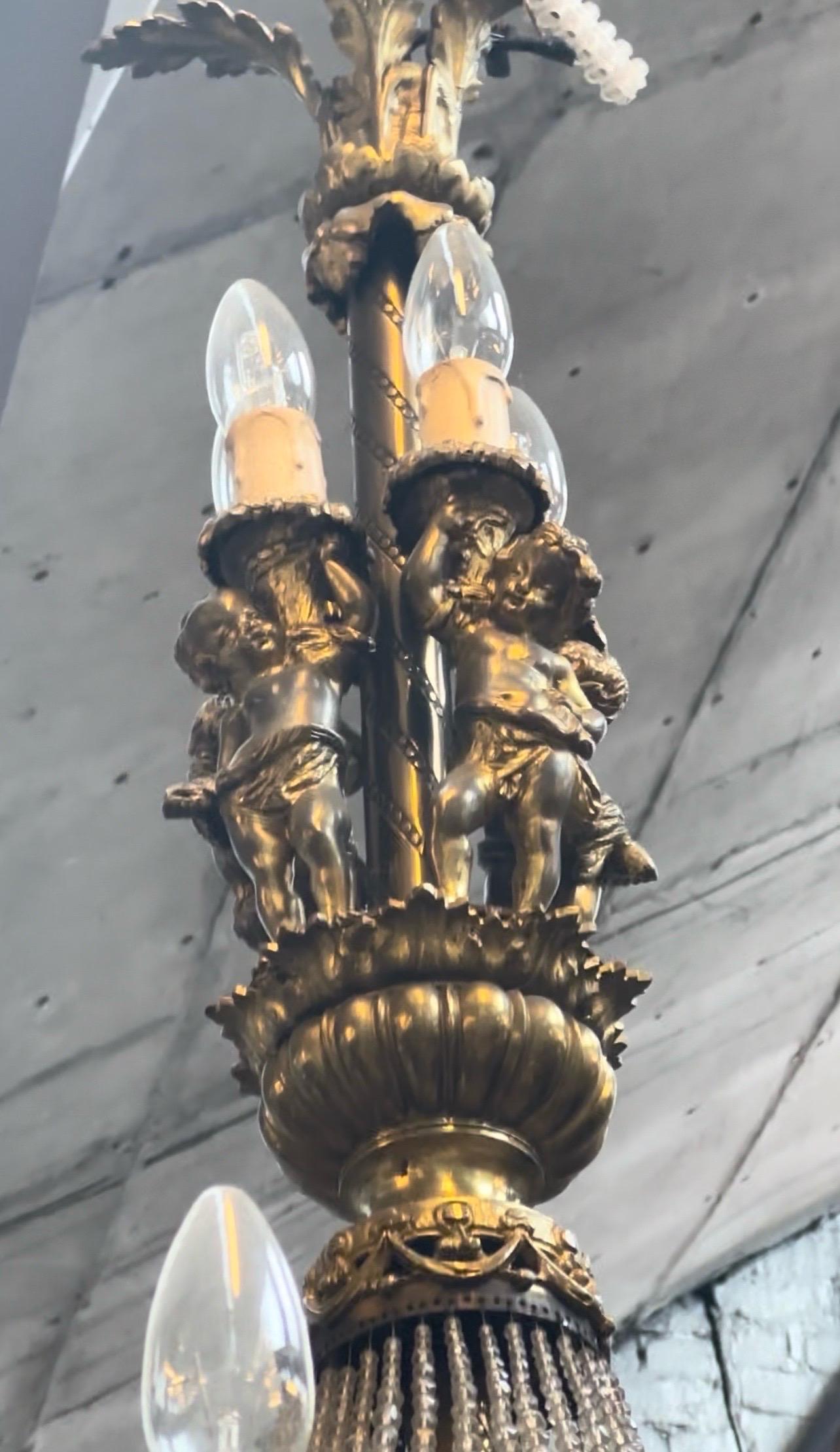 Flick through the images to see this beautiful bronze French empire chandelier and take a look at the intricate detailing throughout. 