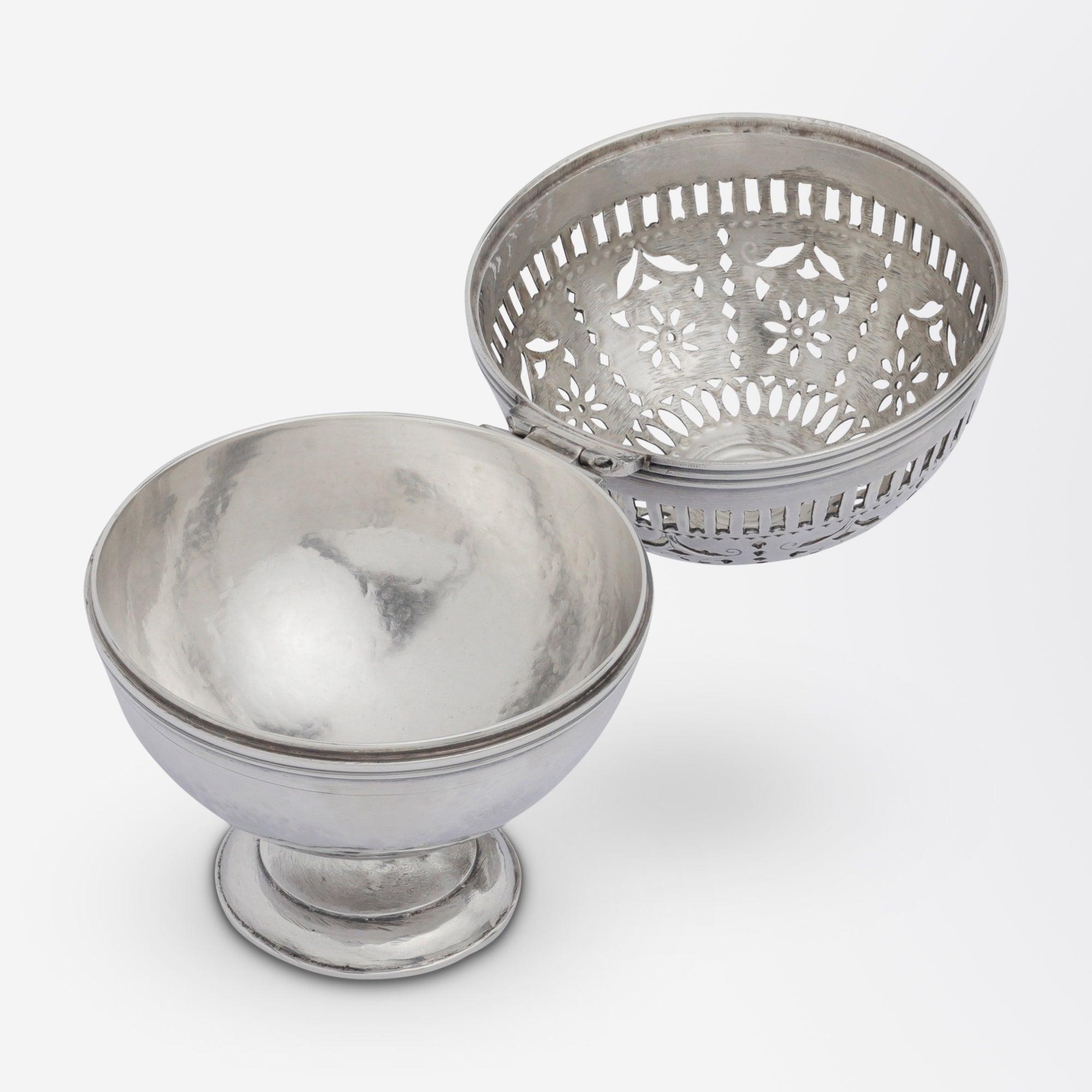 An extremely fine and rare shaving 'sponge box' in silver from the early 19th Century. The footed spherical box originates in Cordoba in Spain and was crafted by Diego de la Vega. The box is signed to the underside 'VEGA 18' along with the rampant