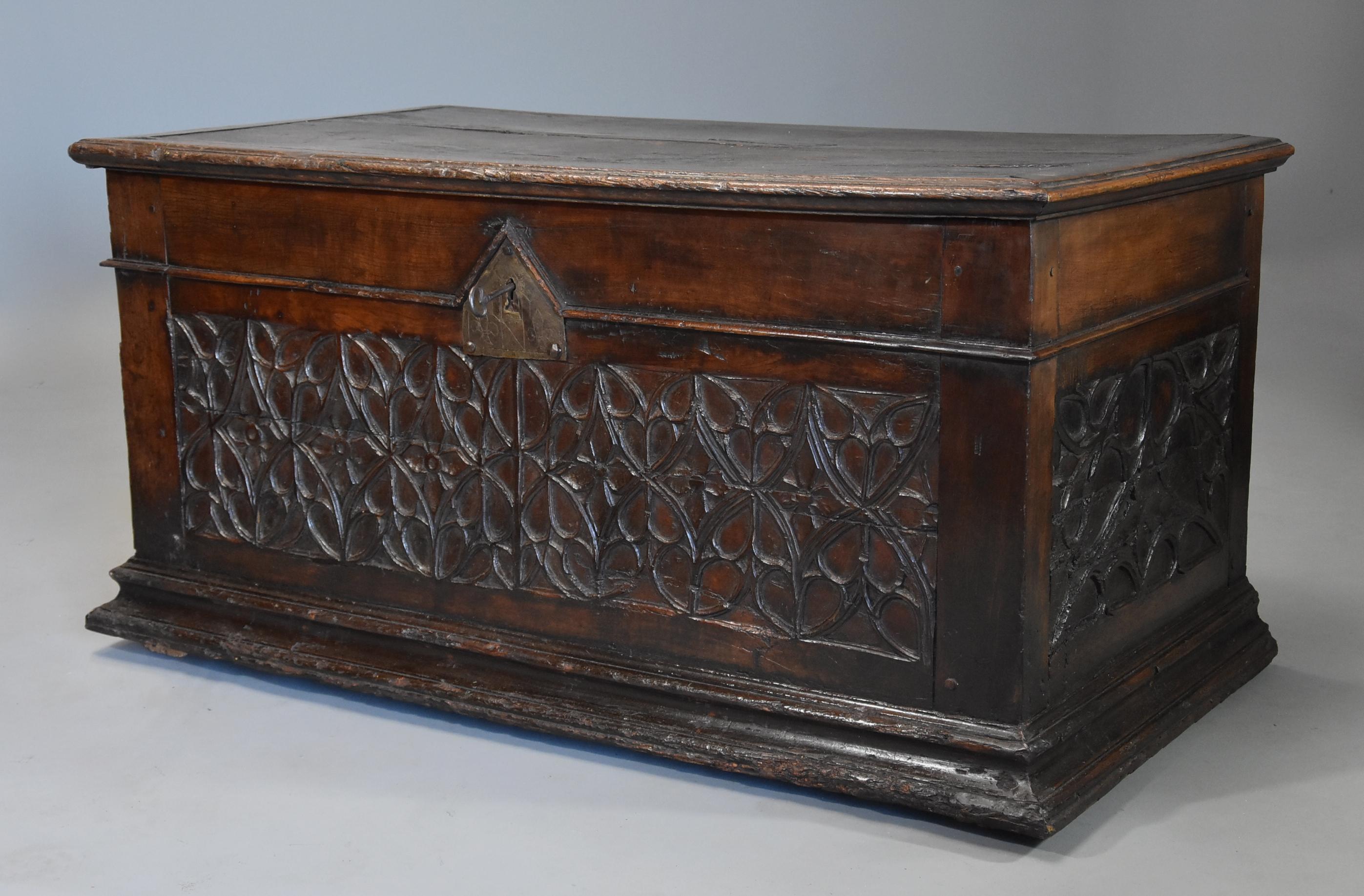 An extremely rare French early 16th century (circa 1500) fruitwood (cherry) coffer of superb patina.

This coffer consists of a solid plank top with moulded edge with evidence of old restoration, the top opening to reveal steel hinges, the