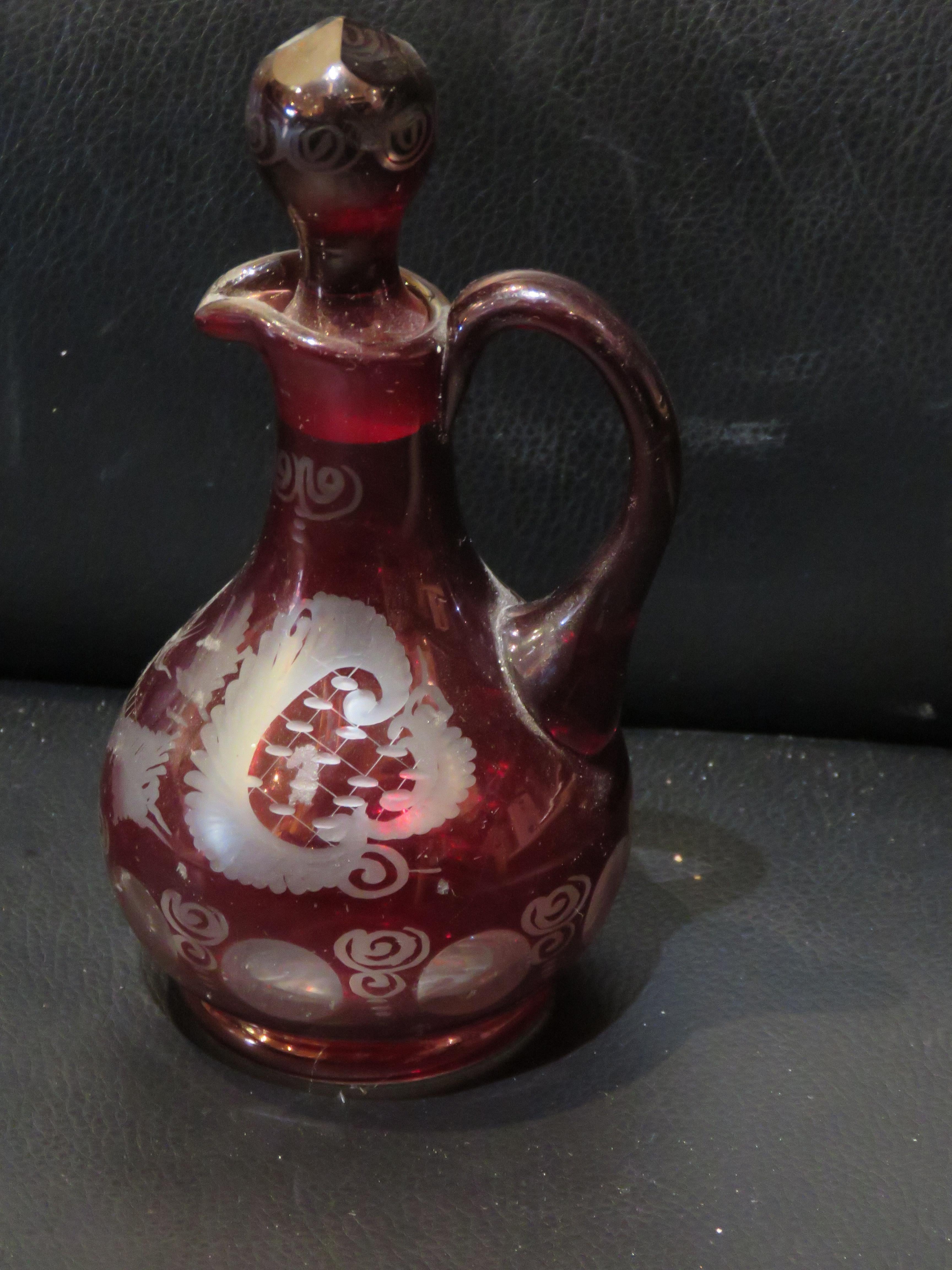 The Following Item we are Offering is A Magnificent Rare 19th Century Bohemian Etched Small Glass Bottle. Cranberry Red to Clear Glass Bottle has scrolled Patterned Etchings throughout with a Bird flying over a lake with Trees, Originally Priced at