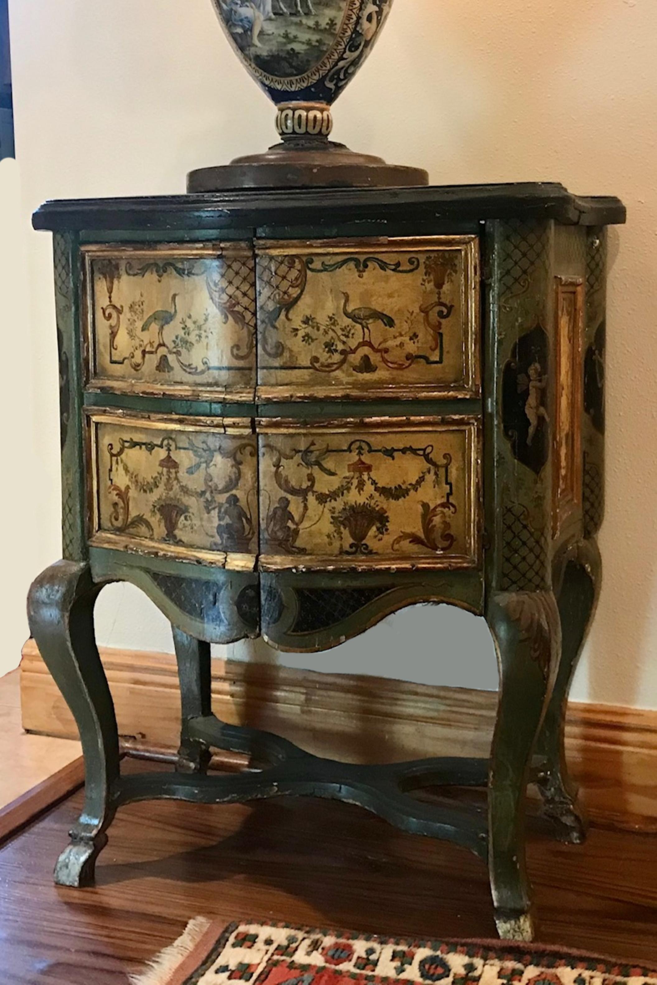 Extremely rare Italian Rococo “Lacca Comodino”, 17th-18th century, Venice

Chamber pot lift-top bedside commode with polychrome painted decoration. This beautiful furniture has a lift up top, revealing an interior covered in red satin in period