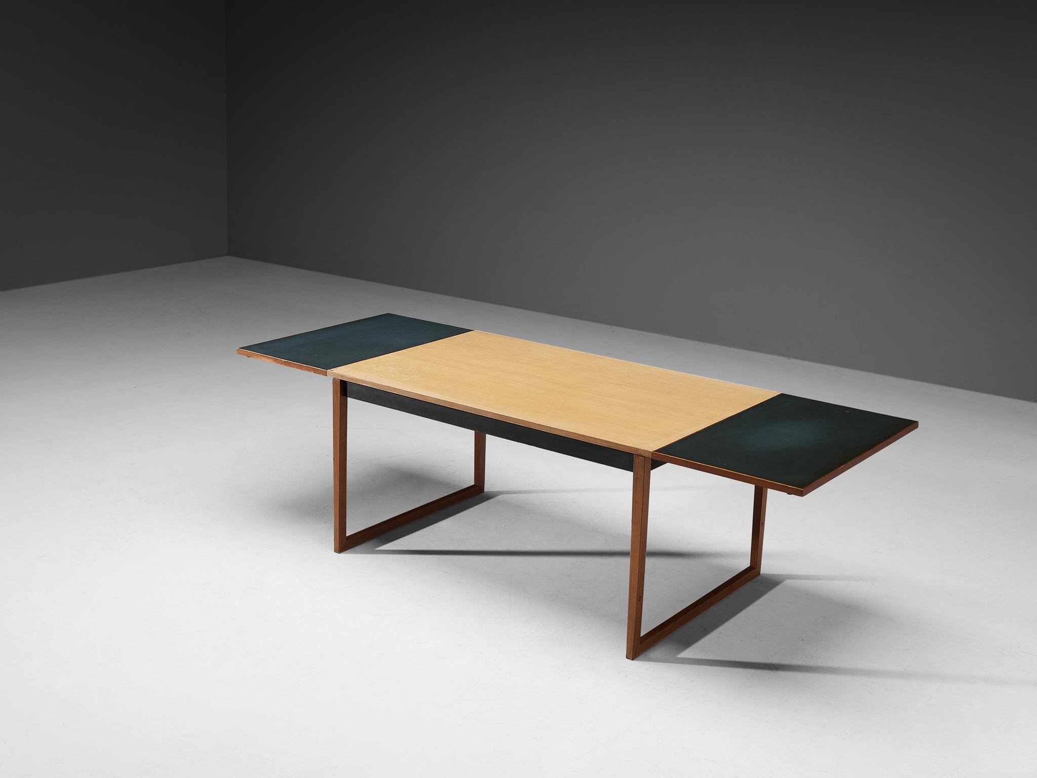Knud Vodder for Niels Vodder, dining table, Oregon pine, formica, Denmark, designed in 1958.

Knud Vodder, the son and maker of this table Niels Vodder, designed this table specifically for his own home. This table was first presented at the