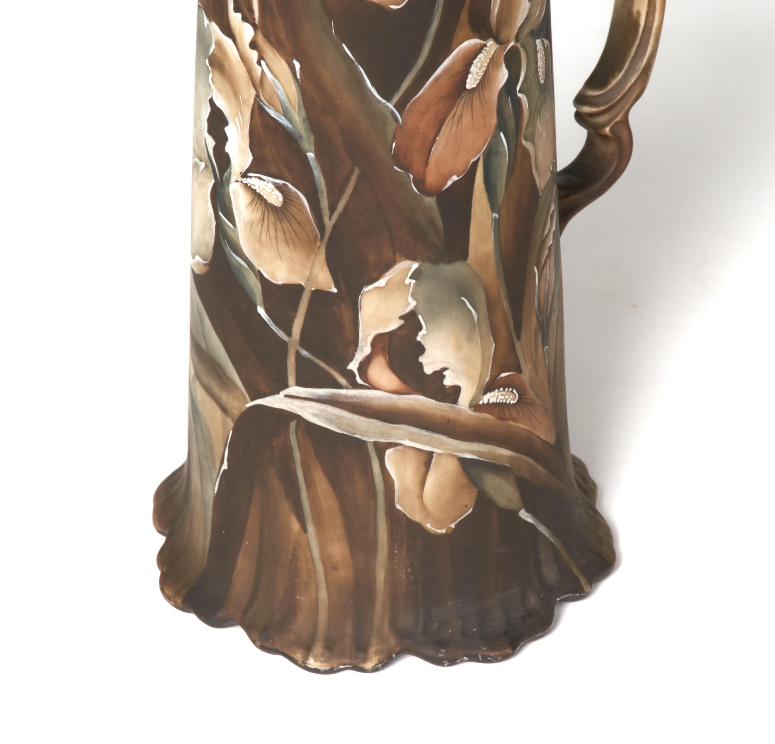 Rare example of Royal Kinran Nippon hand painted porcelain. This large pitcher is decorated with beautiful iris in muted tones. It is signed as shown in the pictures and marked on the bottom with the Royal Kinran mark. Condition is excellent without