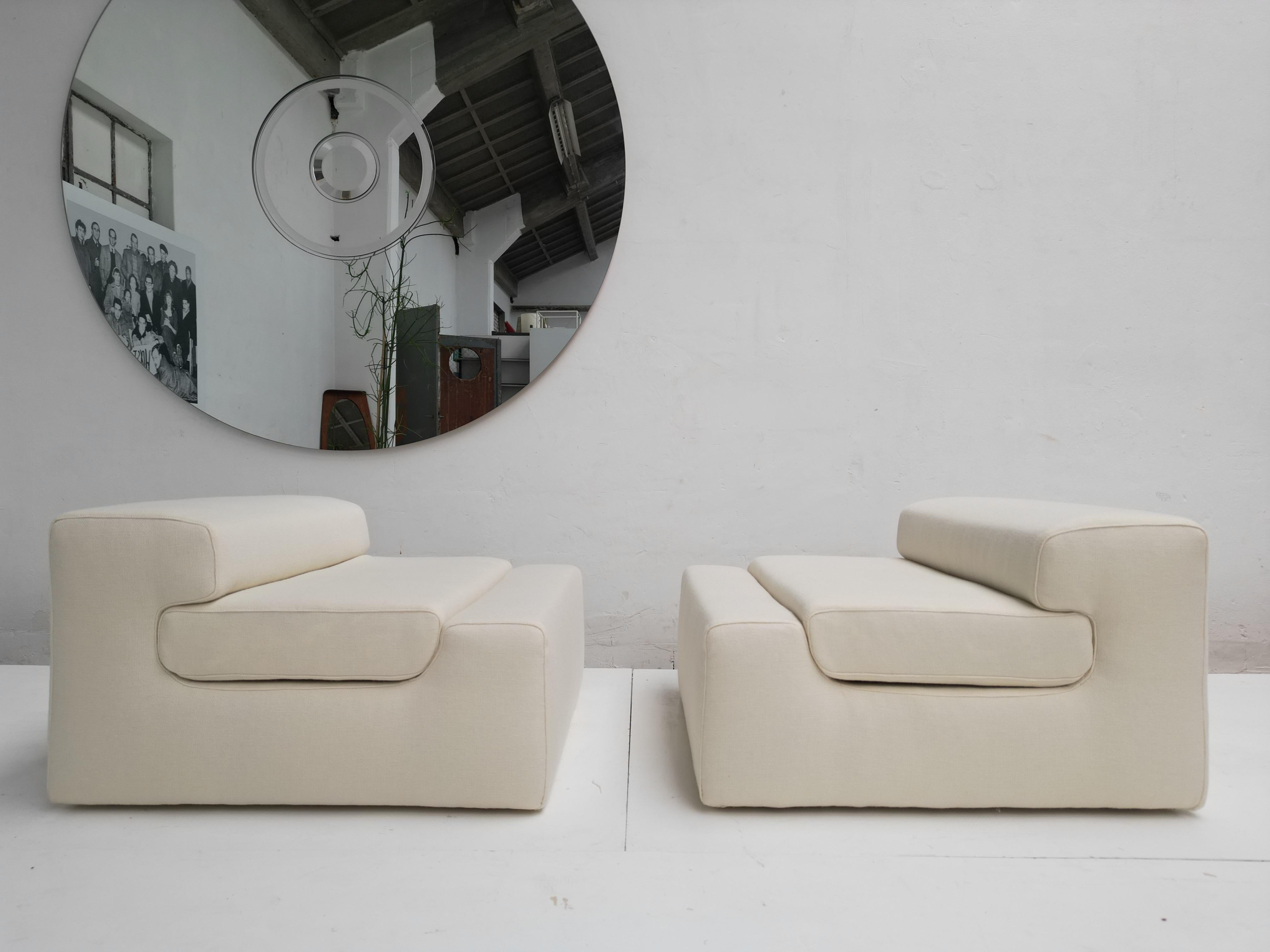 Beautiful and extremely rare pair of sculptural form modular lounge chairs designed by architect, designer and sculptor Angelo Mangiarotti in 1969 for the 'Casa Vitale' in Milan, Italy. The seating that Mangiarotti designed for the 'Casa Vitale' was