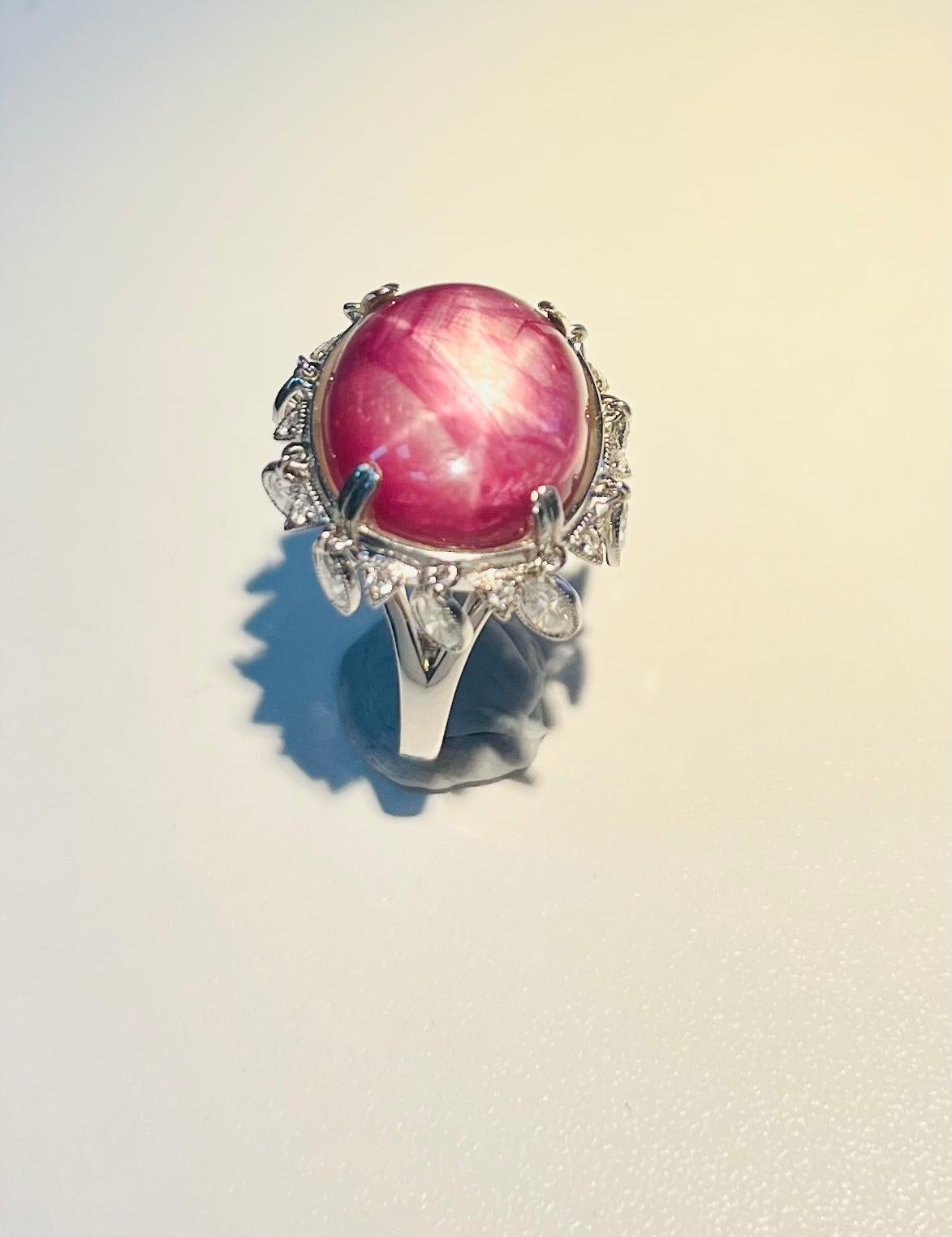 Extremely Rare Natural Star Ruby 20.68 ct 18k 2.06 ct Diamond Art Deco Ring

Presenting the extraordinary rarity of an Extremely Rare Natural Star Ruby Ring, boasting a magnificent 20.68 carat star ruby gemstone set in an exquisite Art Deco
