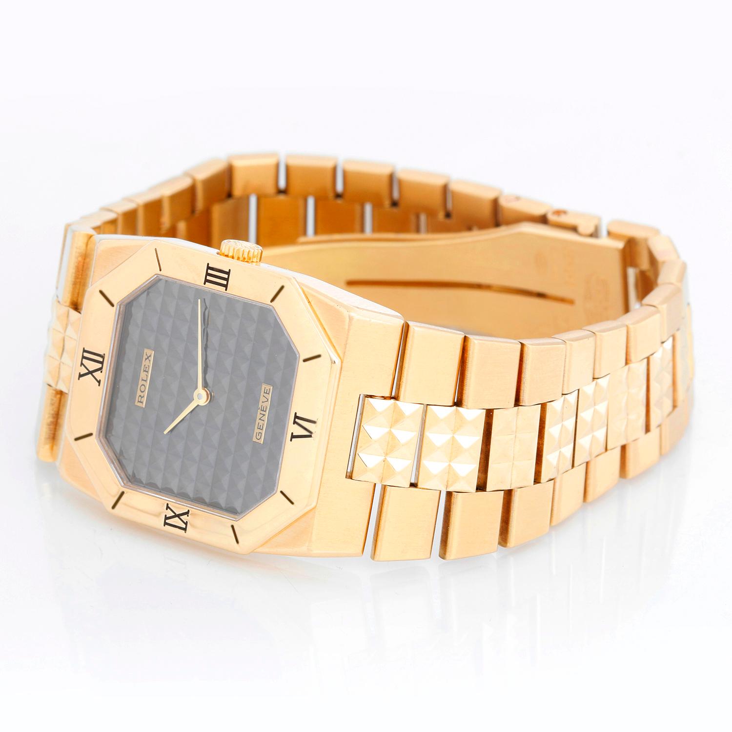 Rolex Cellini Black Pyramid 18k Yellow Gold Watch 5150/8 - Manual winding. 18k yellow gold case (27 x 29 mm). Black Pyramid Dial. 18k Yellow Gold Pyramid Bracelet. Pre-owned with Rolex box and recent Rolex factory service card dated 9/19/2023. While