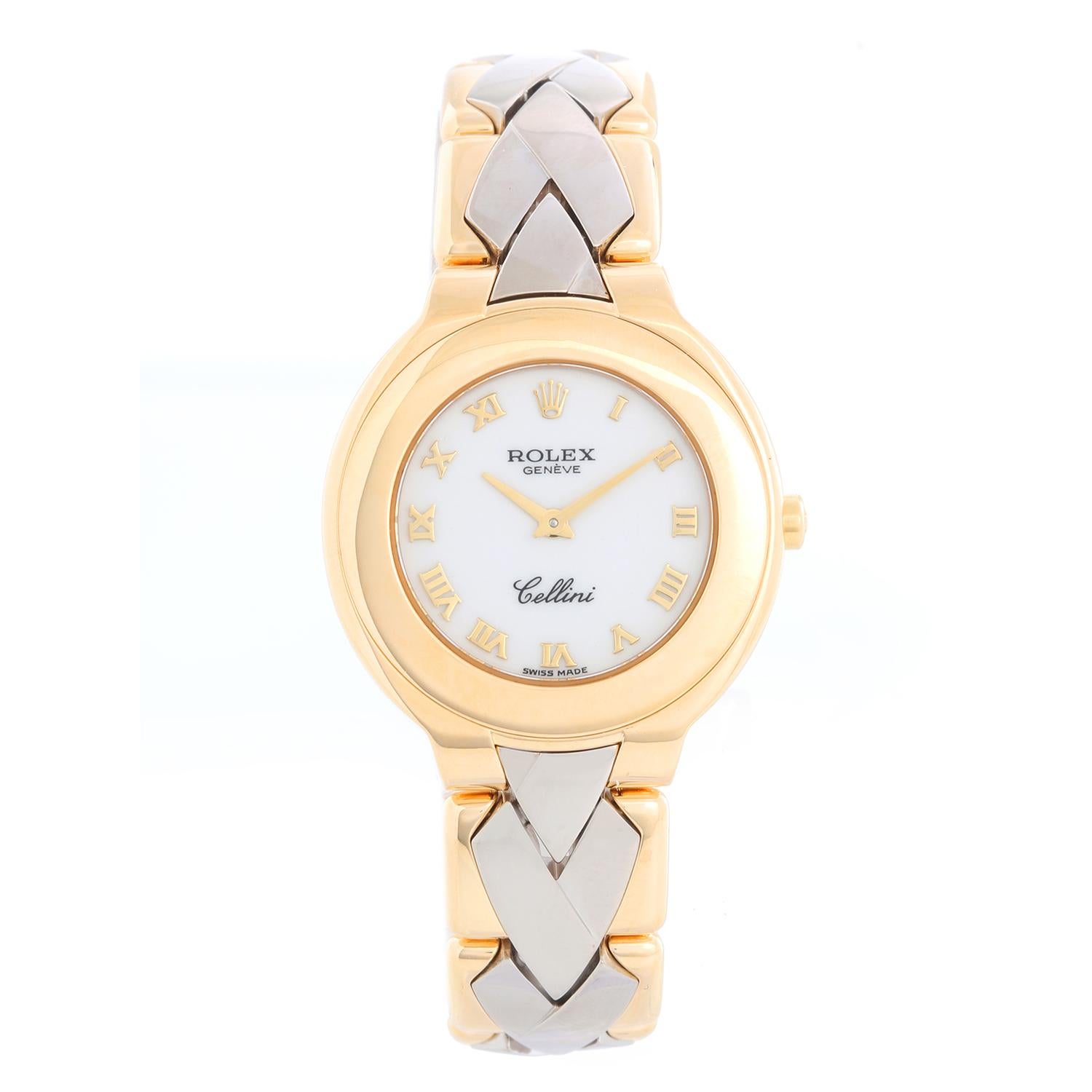 Extremely Rare Rolex Cellini Ladies 18k Yellow Gold & White Gold Watch 6651 - Quartz. 18k yellow gold case (29mm diameter). White dial with gold raised roman numerals. White gold and yellow gold bracelet; measures a 7 1/4 inch wrist. Pre-owned with