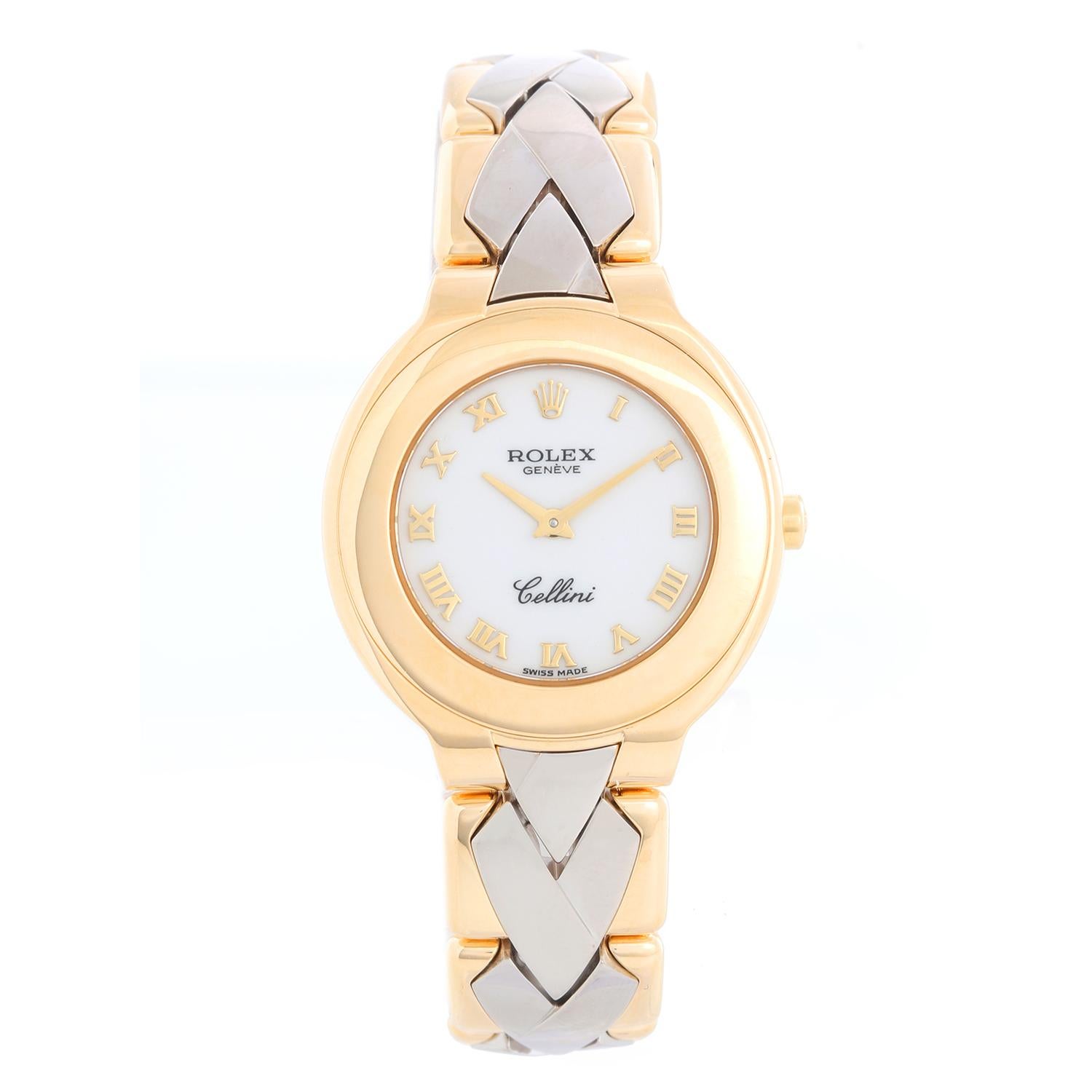 Extremely Rare Rolex Cellini Ladies 18k Yellow Gold & White Gold Watch 6651 - Quartz. 18k yellow gold case (29mm diameter). White dial with gold raised roman numerals. White gold and yellow gold bracelet; measures a 5 1/2 inch wrist. Pre-owned with