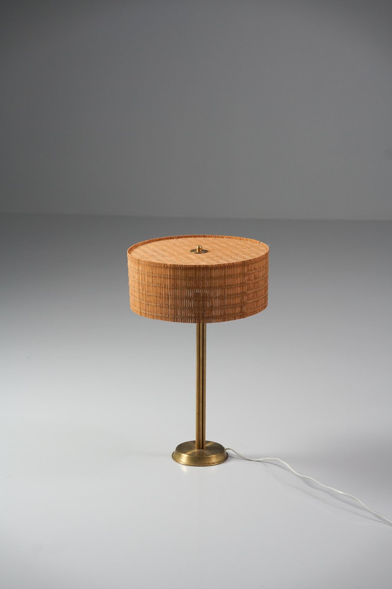Extremely rare table lamp, designed by Greta Lisa Jäderholm-Snellman, 1950/1960s. Brass frame with wooden slat lampshade. Designers mark. Good vintage condition, minor patina consistent with age and use. 

Greta Lisa Jäderholm-Snellman (1894-1973)