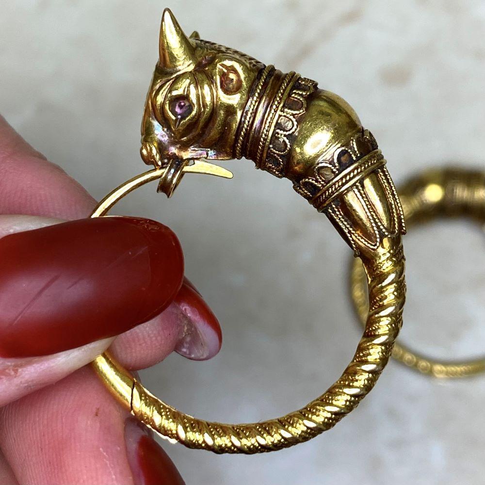 A very rare and collectible Tiffany and Co. Earrings from the 1880s. Handcrafted in 18k Yellow Gold. 

These vintage Tiffany earrings, inspired by a creation excavated in 1875 by General Louis Palma di Cesnola, harken back to ancient jewelry dating