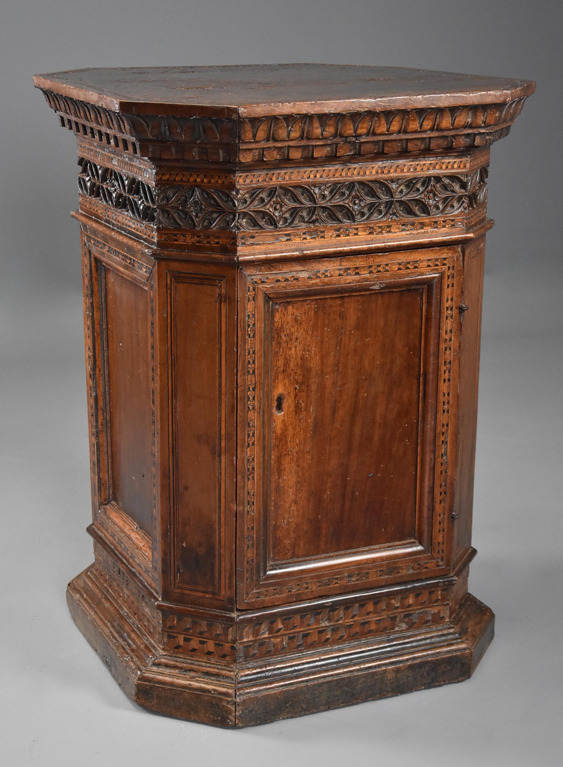 An extremely rare Tuscan mid-15th century (circa 1460) early Renaissance freestanding walnut sacristy cupboard, probably Florentine, in the form of a pedestal.

This rare and exceptional piece consists of a solid walnut top of square shape with