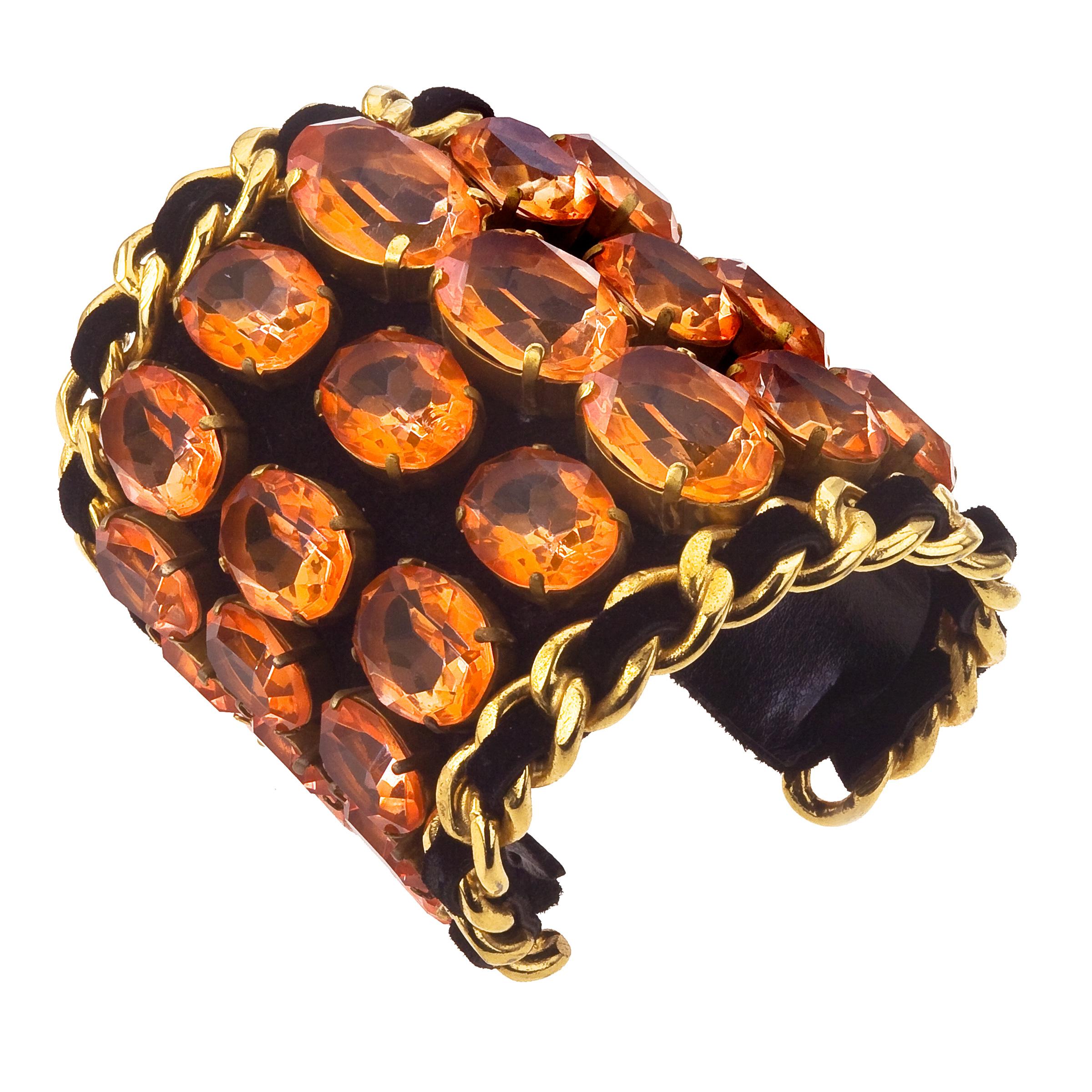 Extremely rare vintage Chanel bangle from Karl Lagerfeld era. It has large orange crystals all around. 