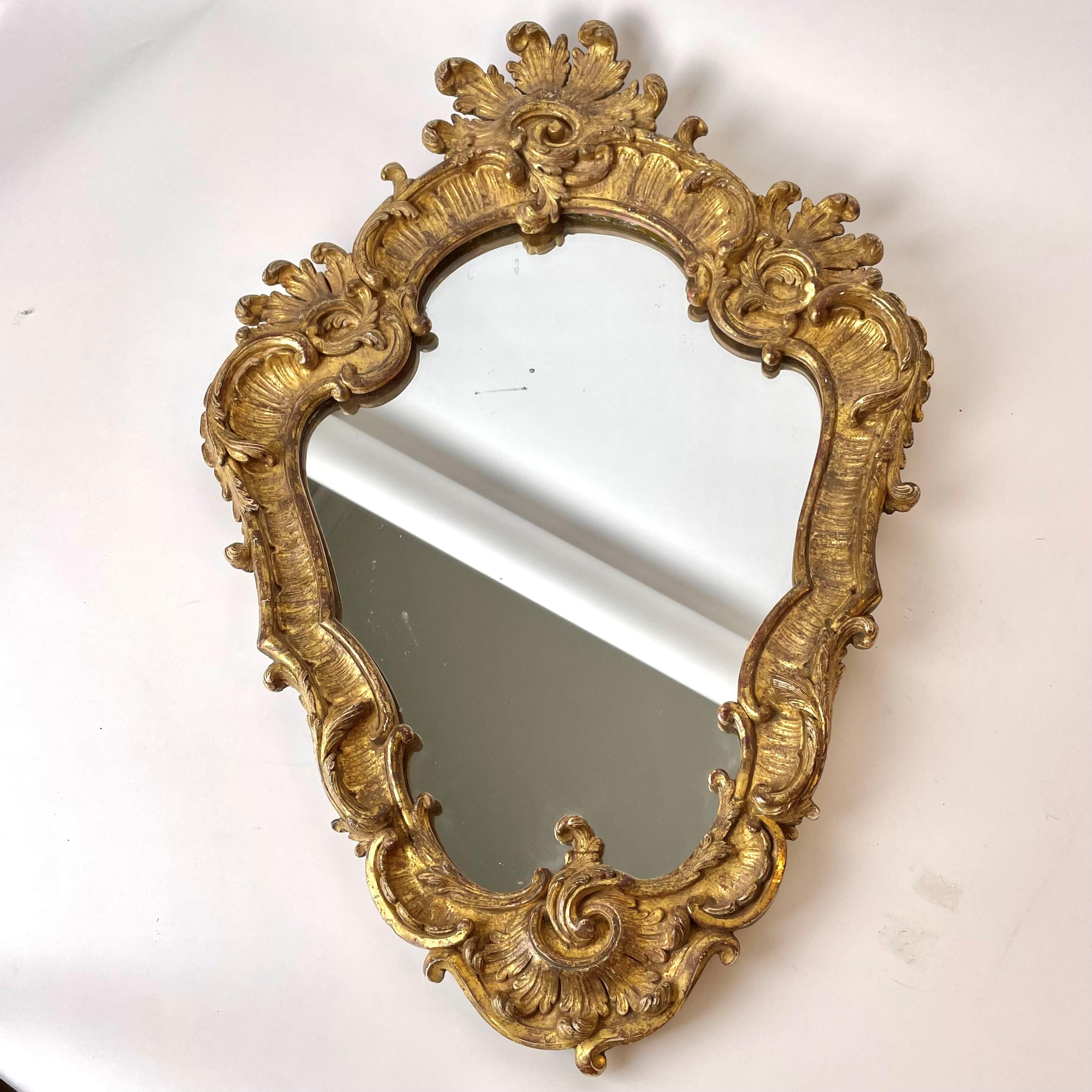 Elegant French Rococo Mirror with original gilding from Mid-18th Century For Sale 5