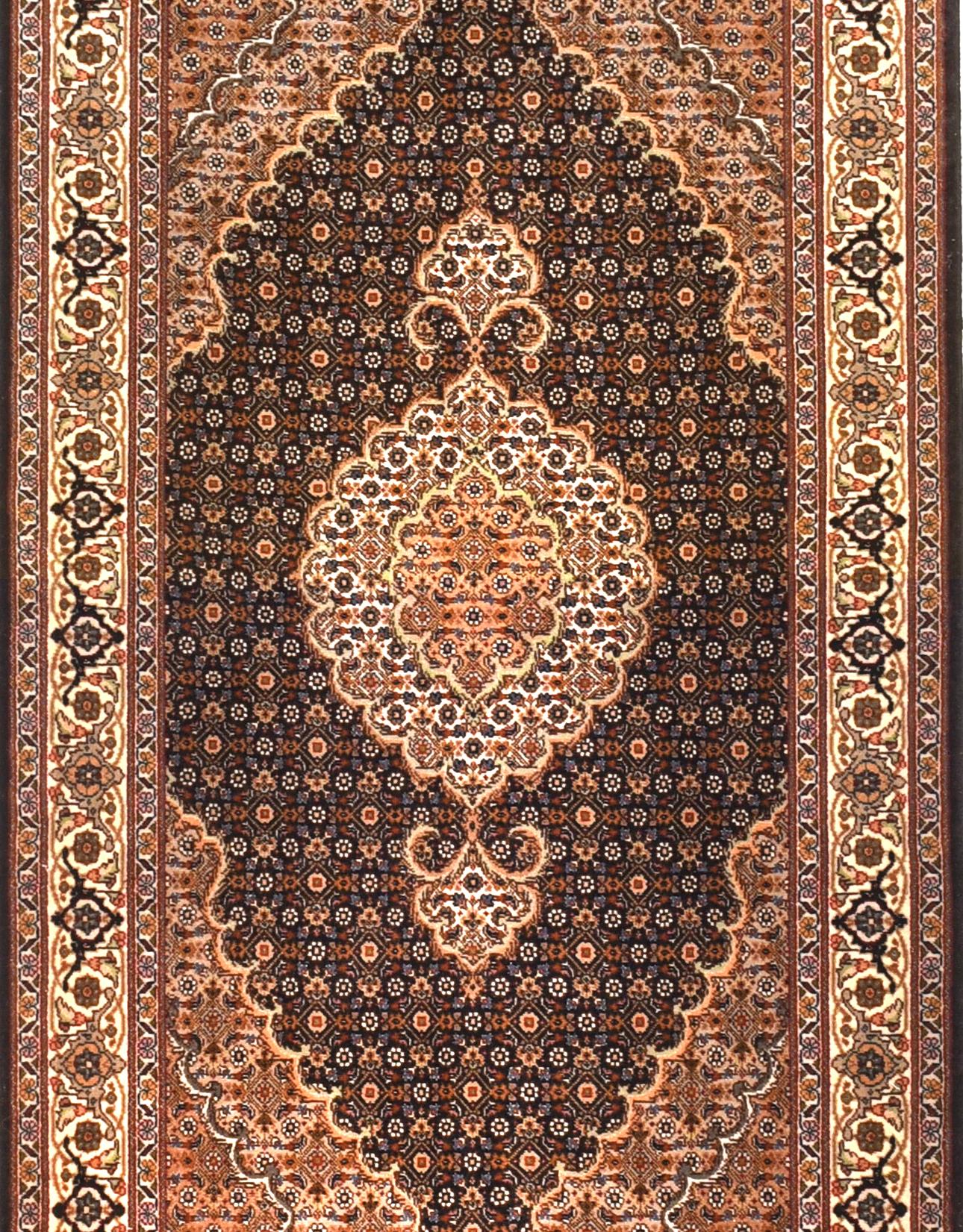 The Tabriz Mahi motif is used for everything from border motifs to medallions and all-over patterns, but the most impressive style is the Persian Tabriz Mahi rug that features an inset medallion decorated with a continuous Mahi pattern. It’s not