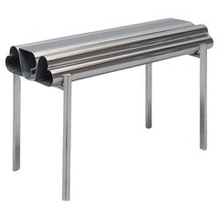 Extruded and polished aluminium bench "Love seat" by Deon Rubi. Argentina, 2024.