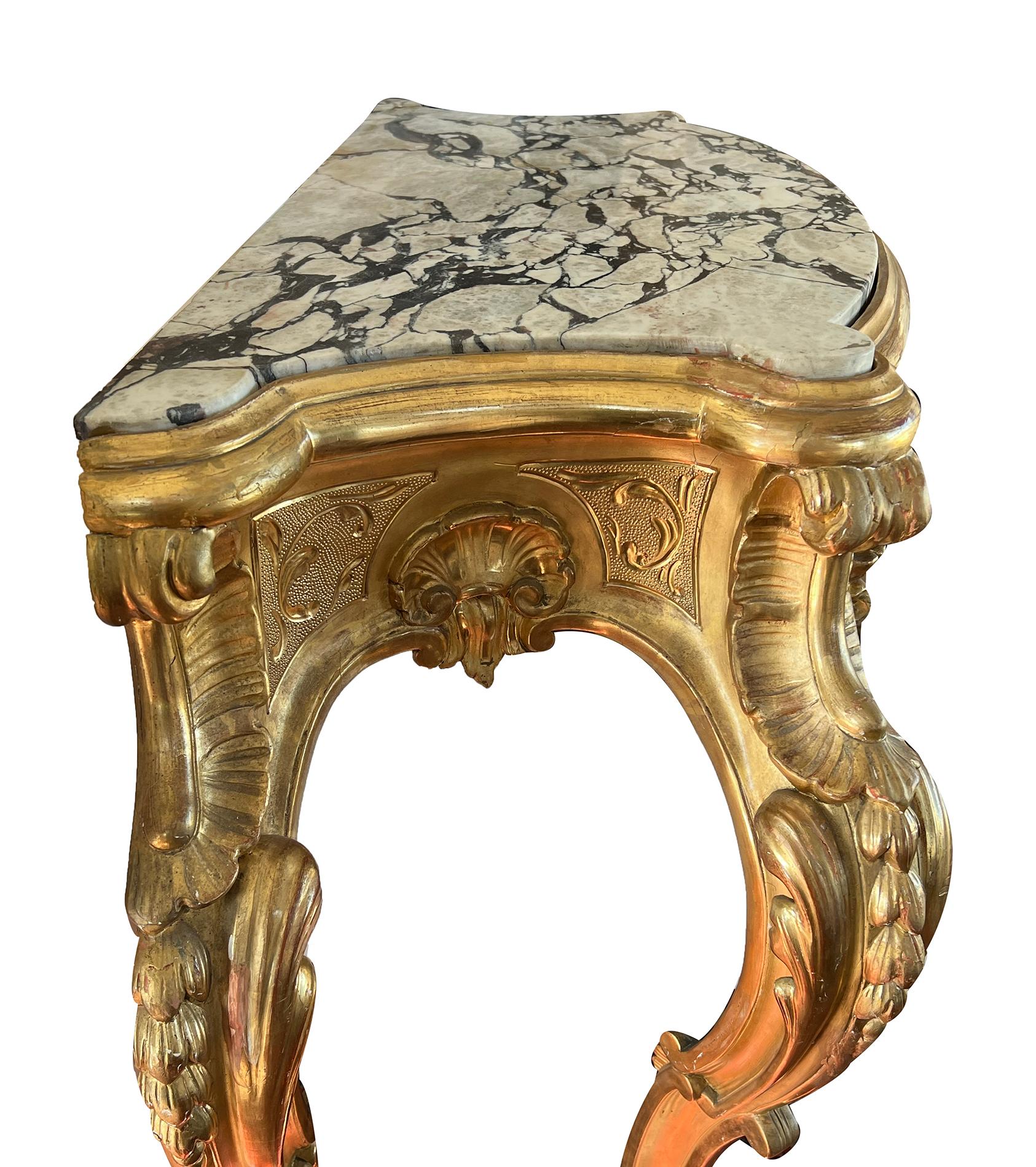 Exuberantly-carved French Rococo Revival Giltwood Console Table with Marble Top For Sale 2