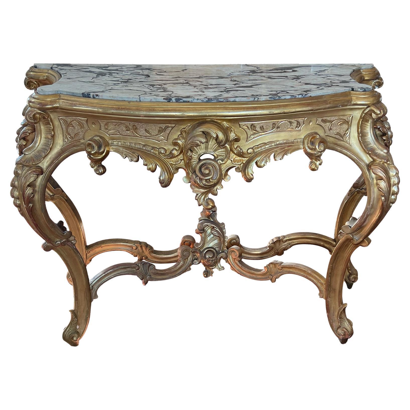 Exuberantly-carved French Rococo Revival Giltwood Console Table with Marble Top For Sale