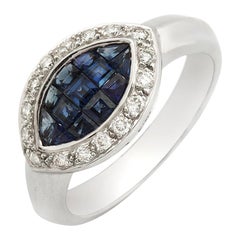 Eye 0.81 Carat Sapphires and 0.28 Carat Diamonds in 18 Karat Gold Band Ring