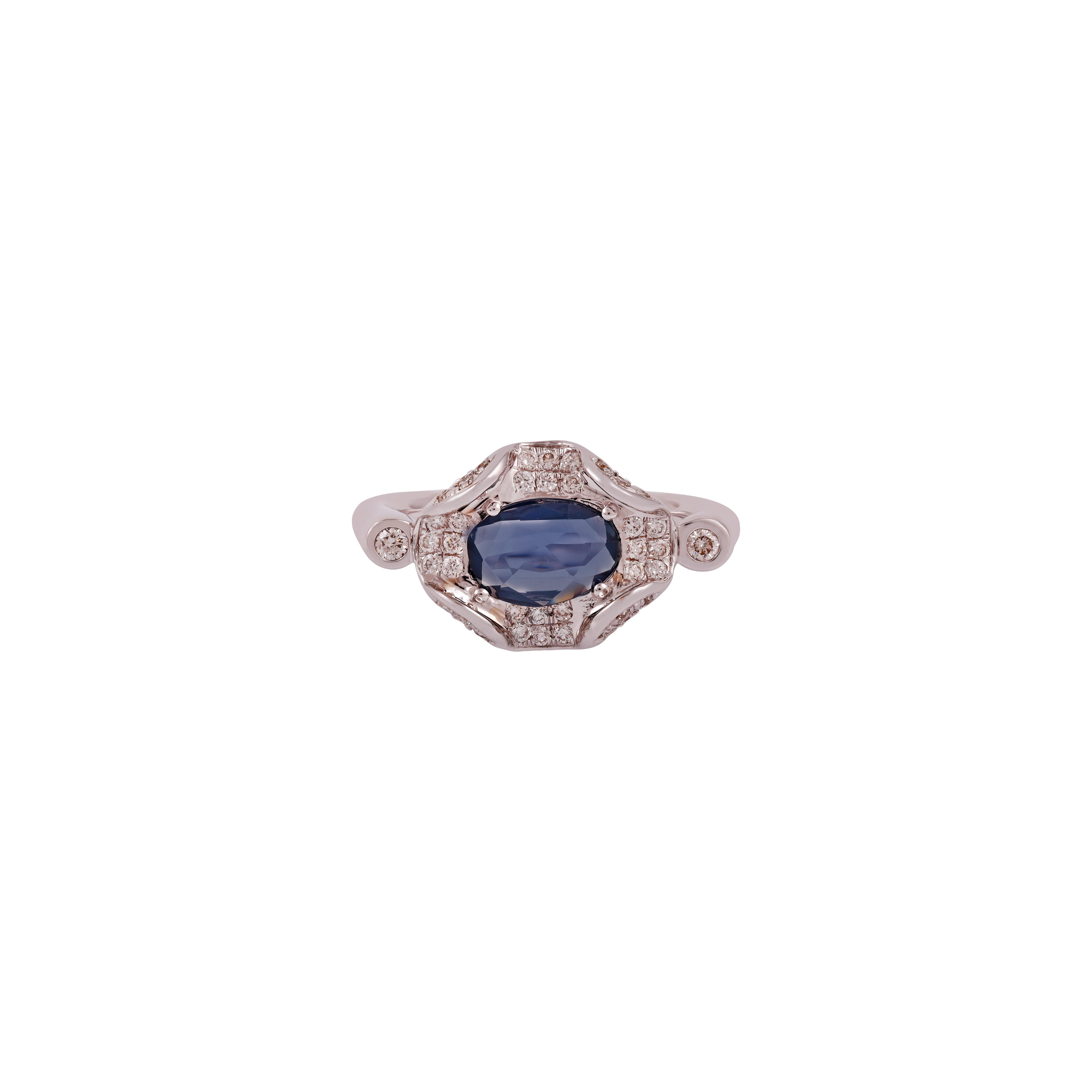 Eye Catching Blue Sapphire with Diamond
1 Oval shape Blue Sapphire in 0.73 CTS
42 Diamond  0.33
18 K White gold in 4.74 GMS
SIZE- 6
Size Can be resize.
