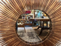 Eye Catching Large Round Mirror with Rustic Wooden Rolling Pins