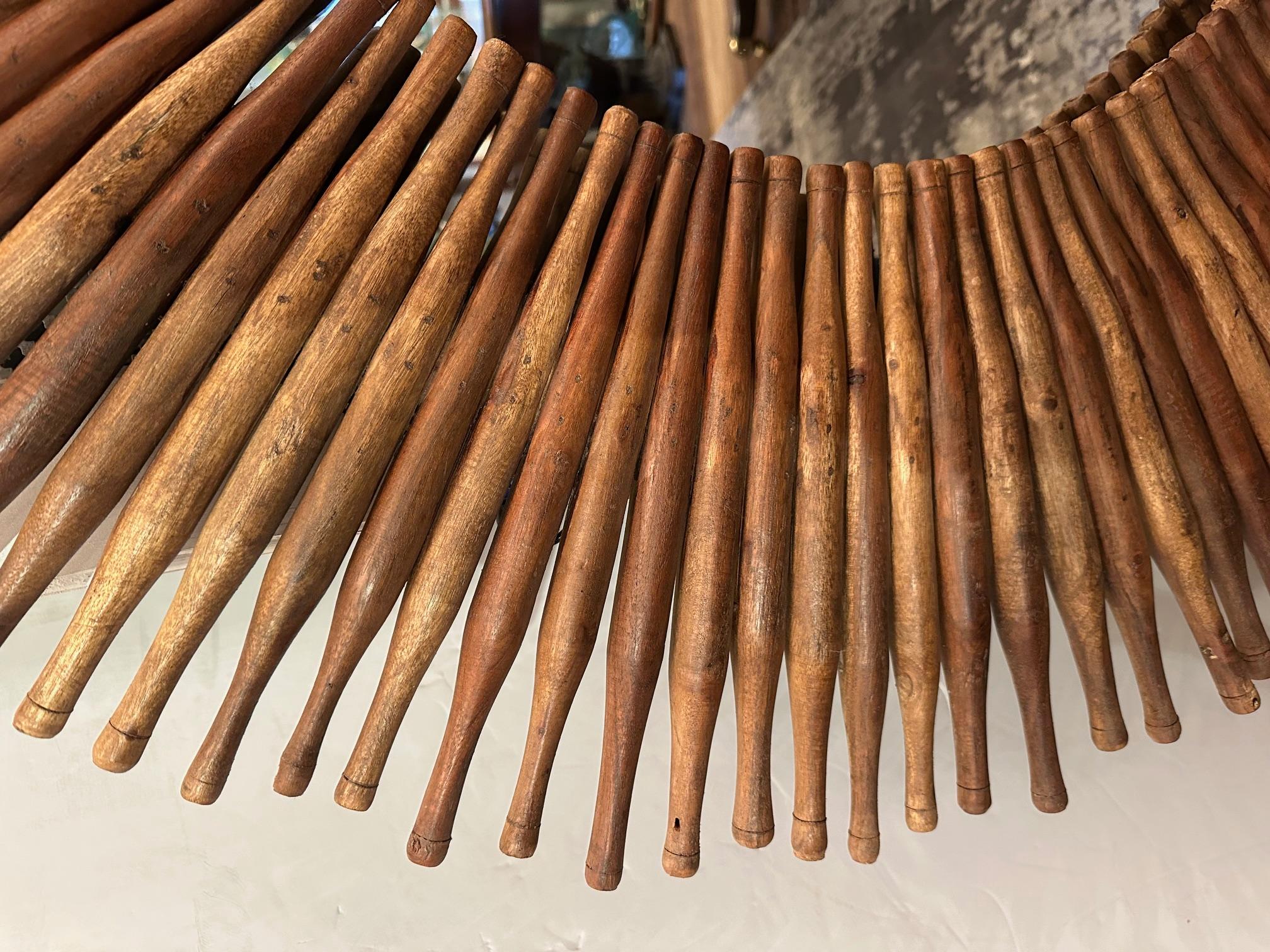 American Eye Catching Large Round Mirror with Rustic Wooden Rolling Pins For Sale