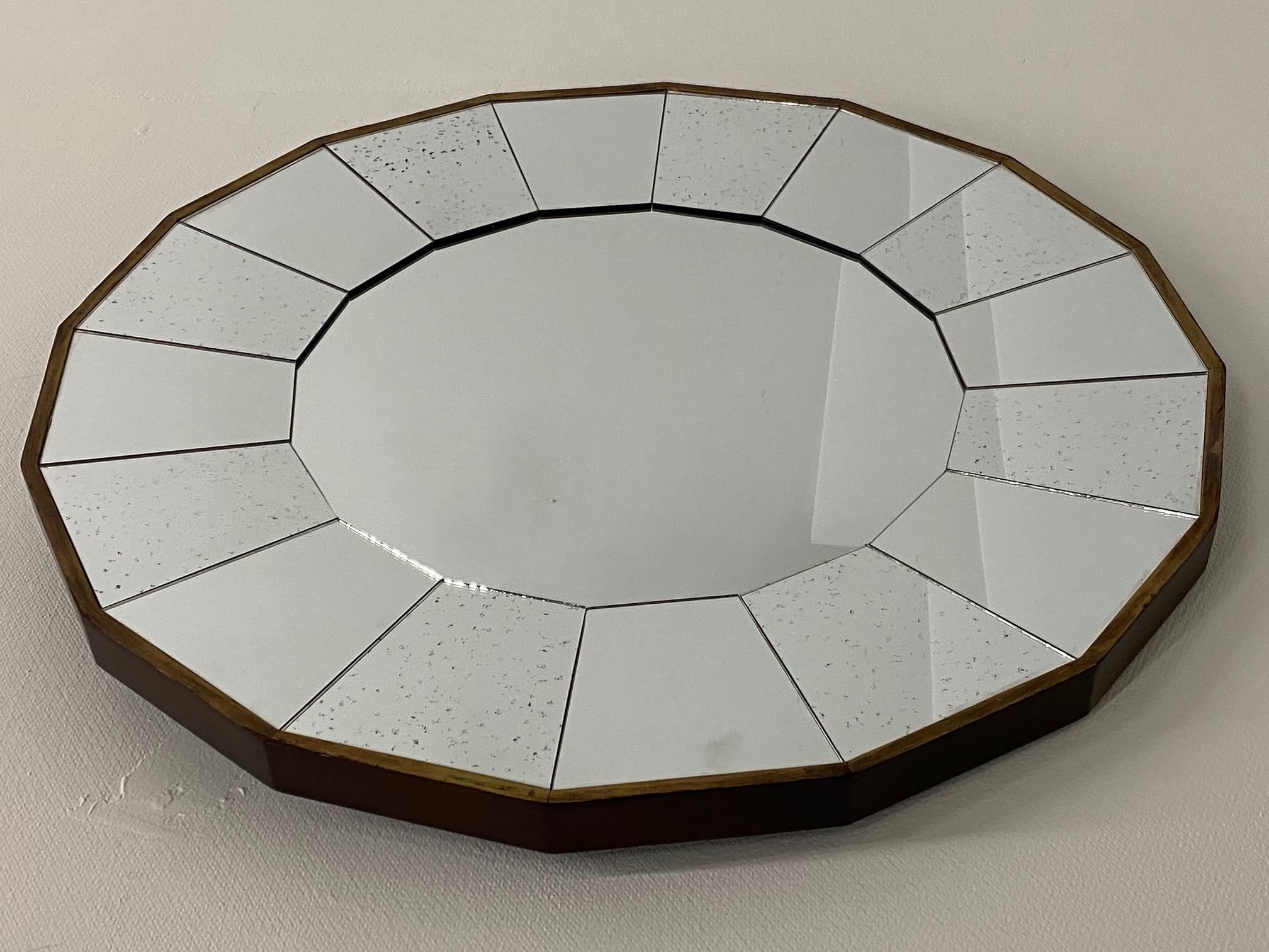 round scalloped mirror