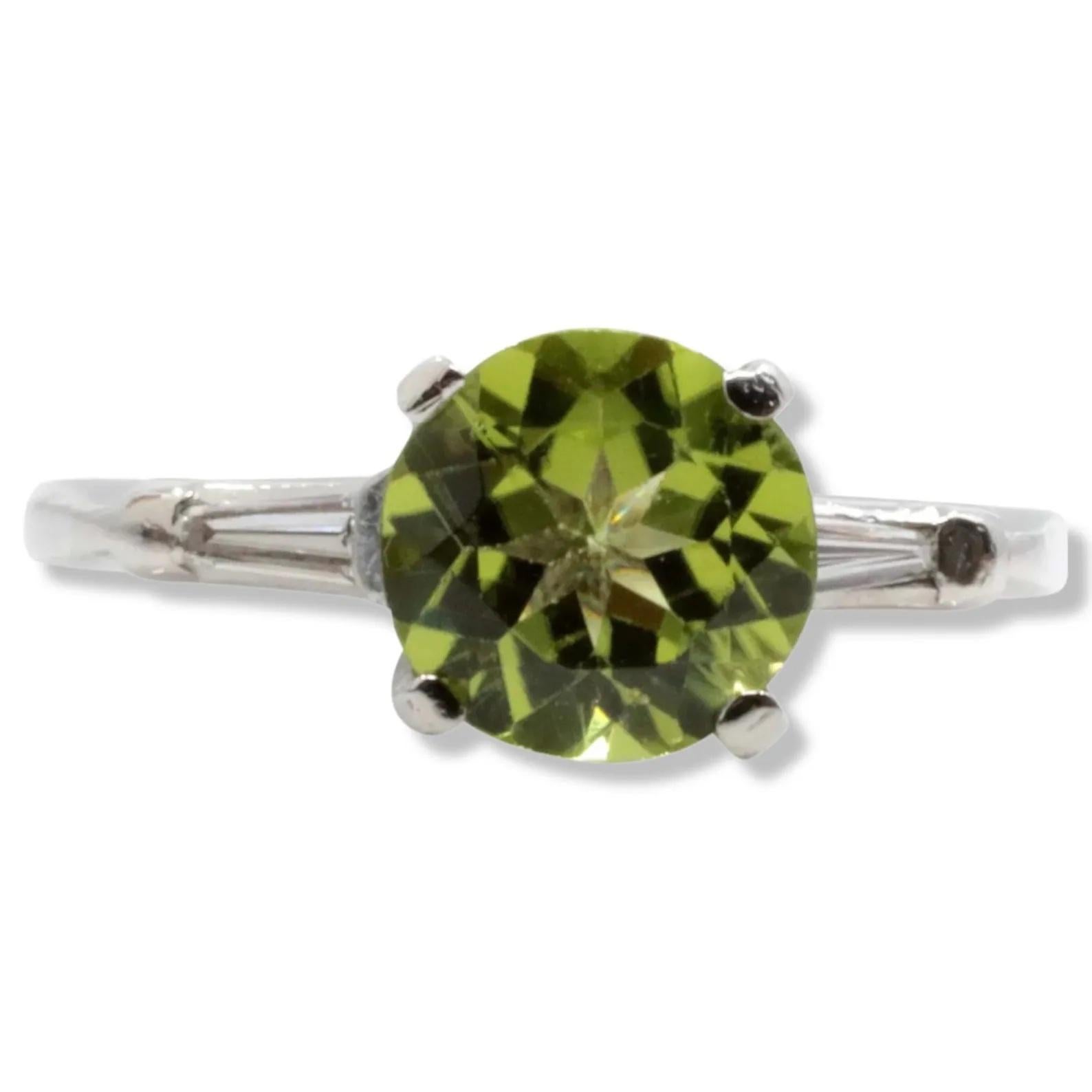 Eye Catching Peridot & Baguette Diamond Three Stone Ring in Platinum For Sale