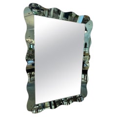 Miroir encadré en forme de vague rétro qui attire l'attention