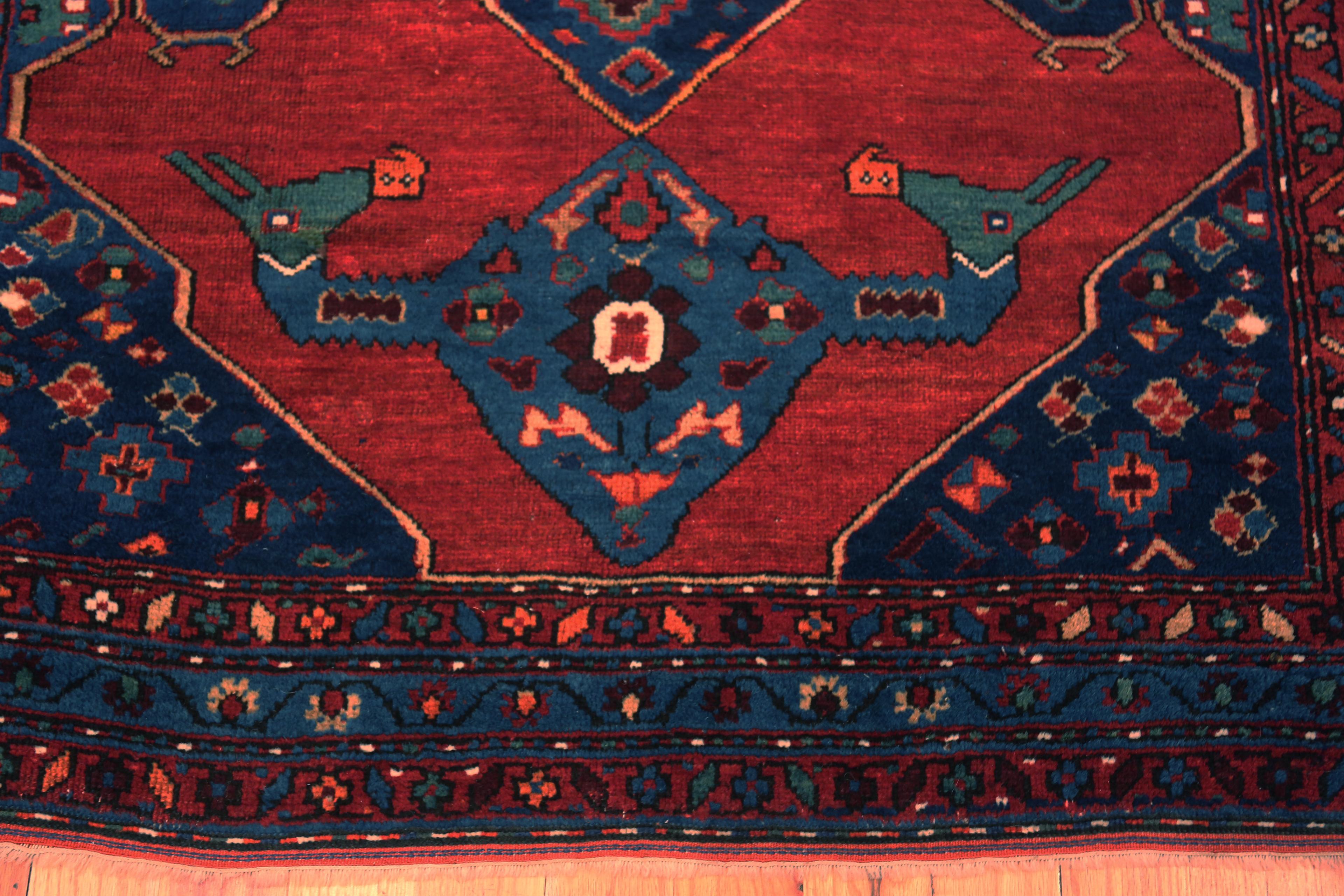 Eye-Catching Small Size Antique Red And Blue Tribal Turkish Karapinar Area Rug, Country of origin: Turkish Rugs, Circa date: 1900 