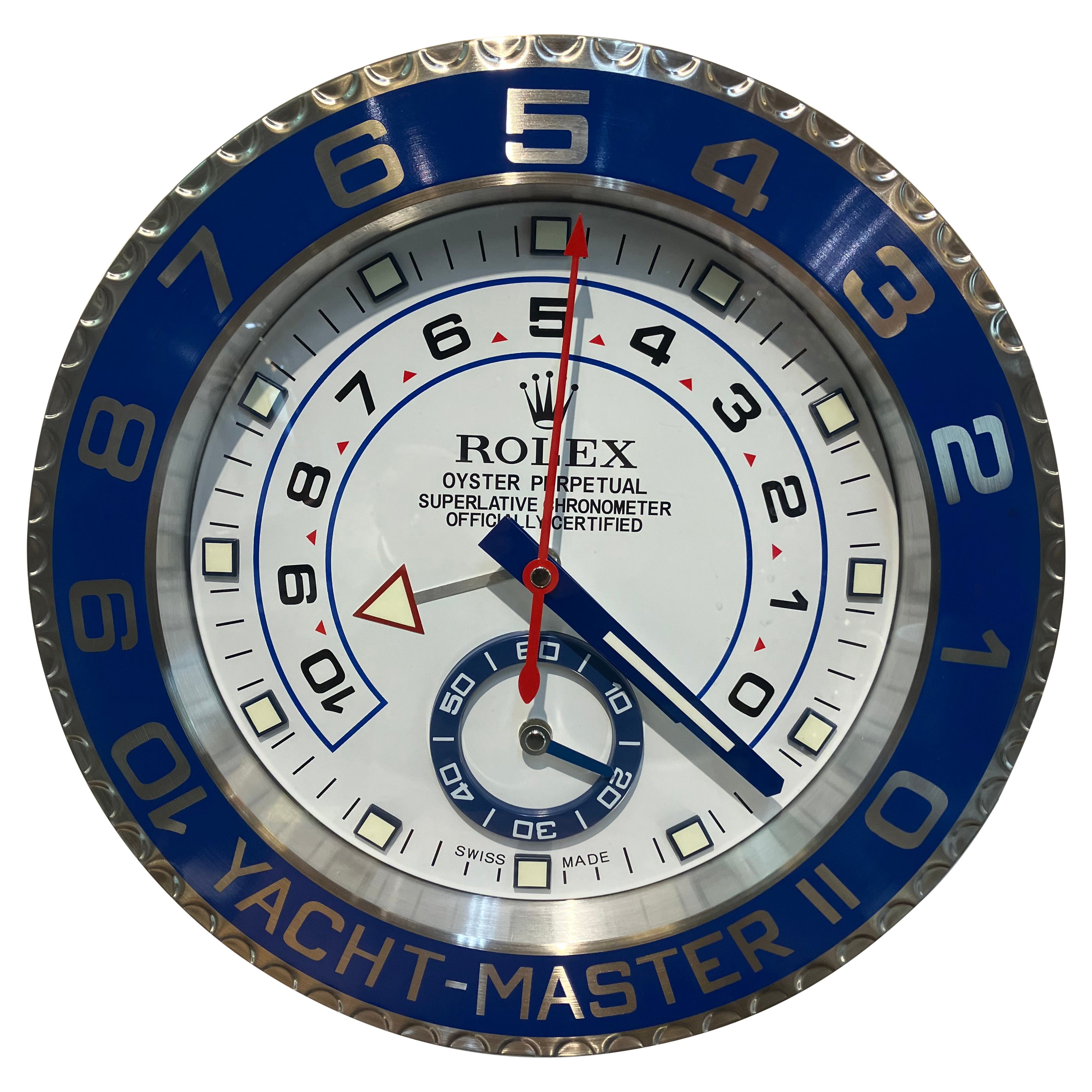 Orologio da parete Rolex d
epoca con bordo blu di grande impatto visivo