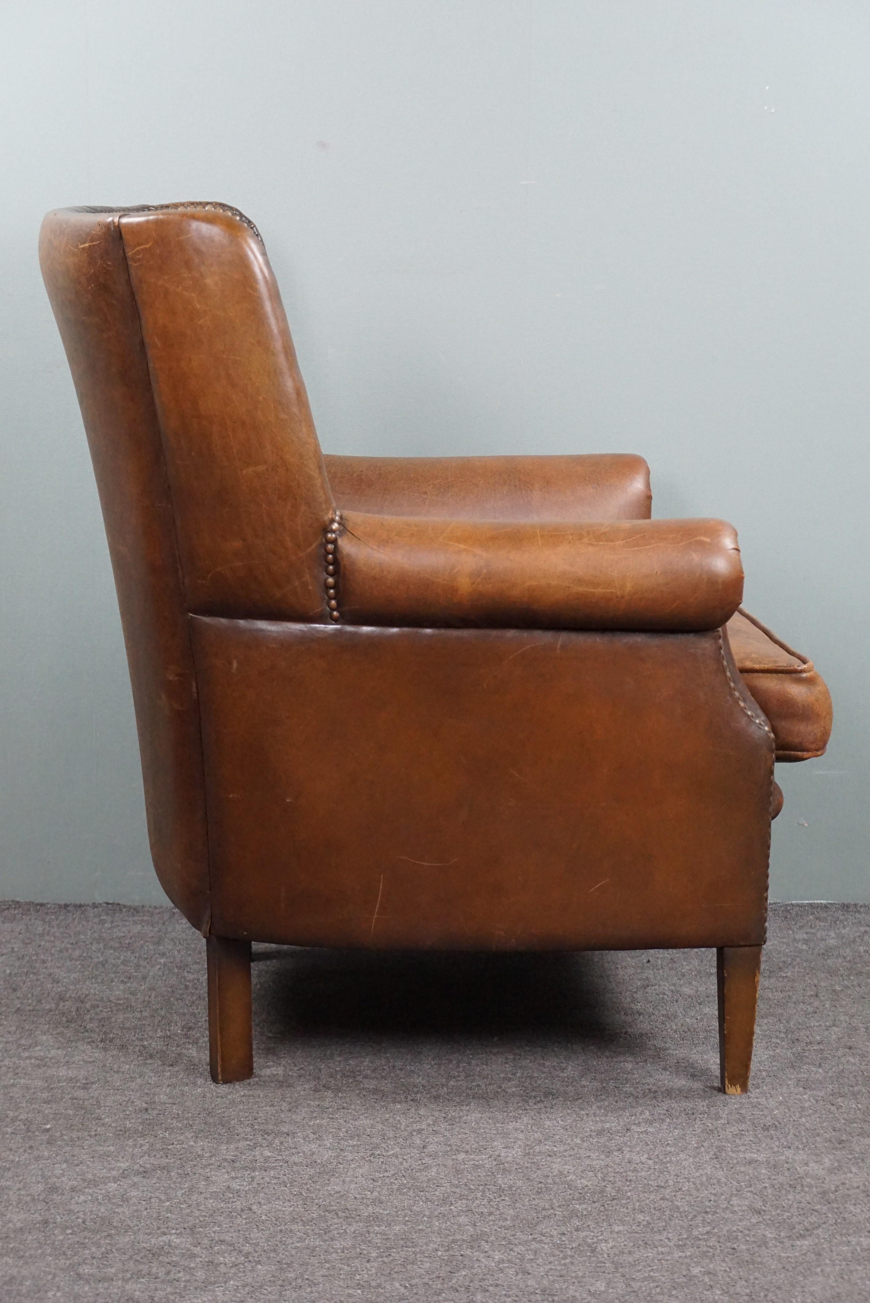 Contemporary Eye-catching weathered sheep leather wingchair For Sale