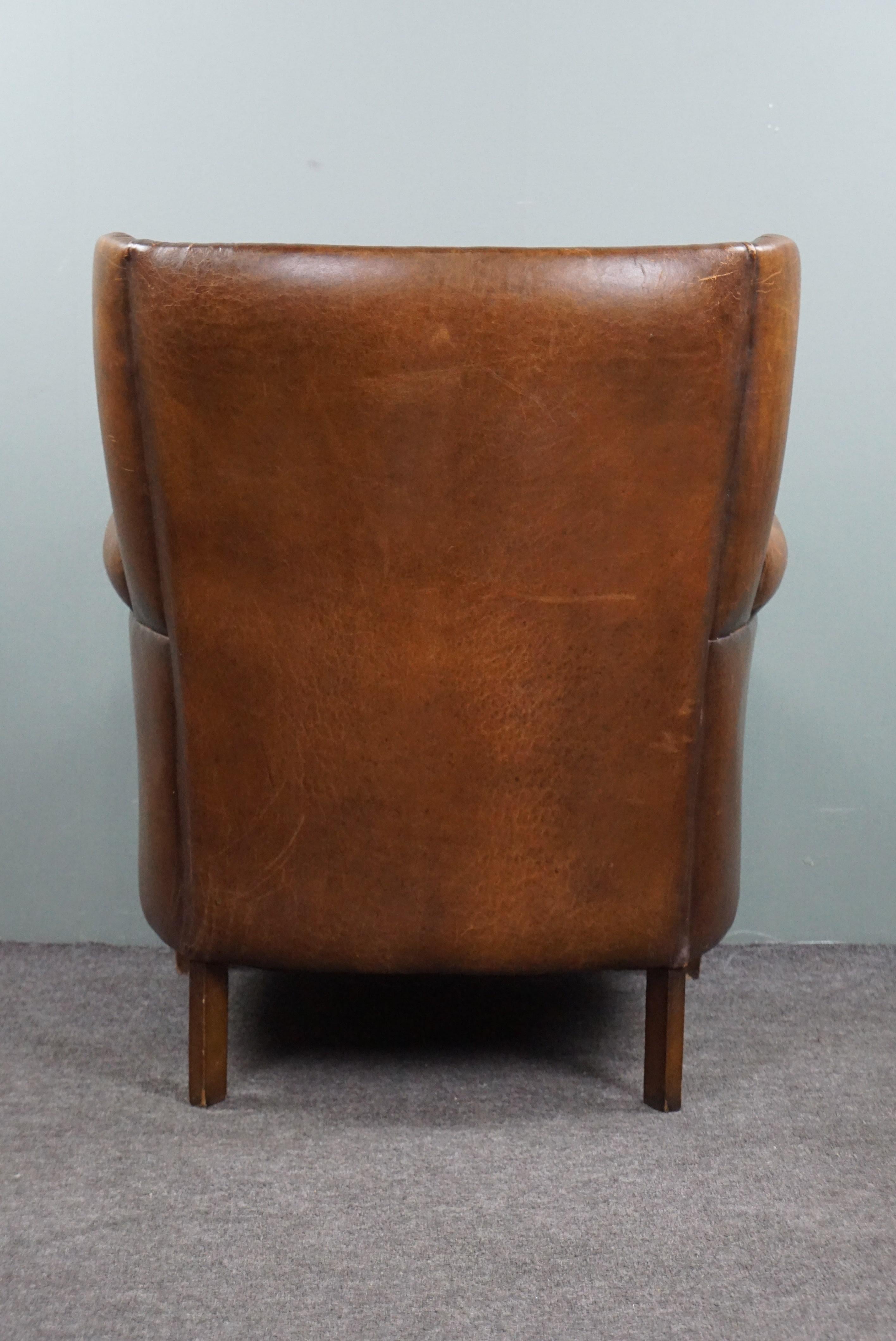 Leather Eye-catching weathered sheep leather wingchair For Sale