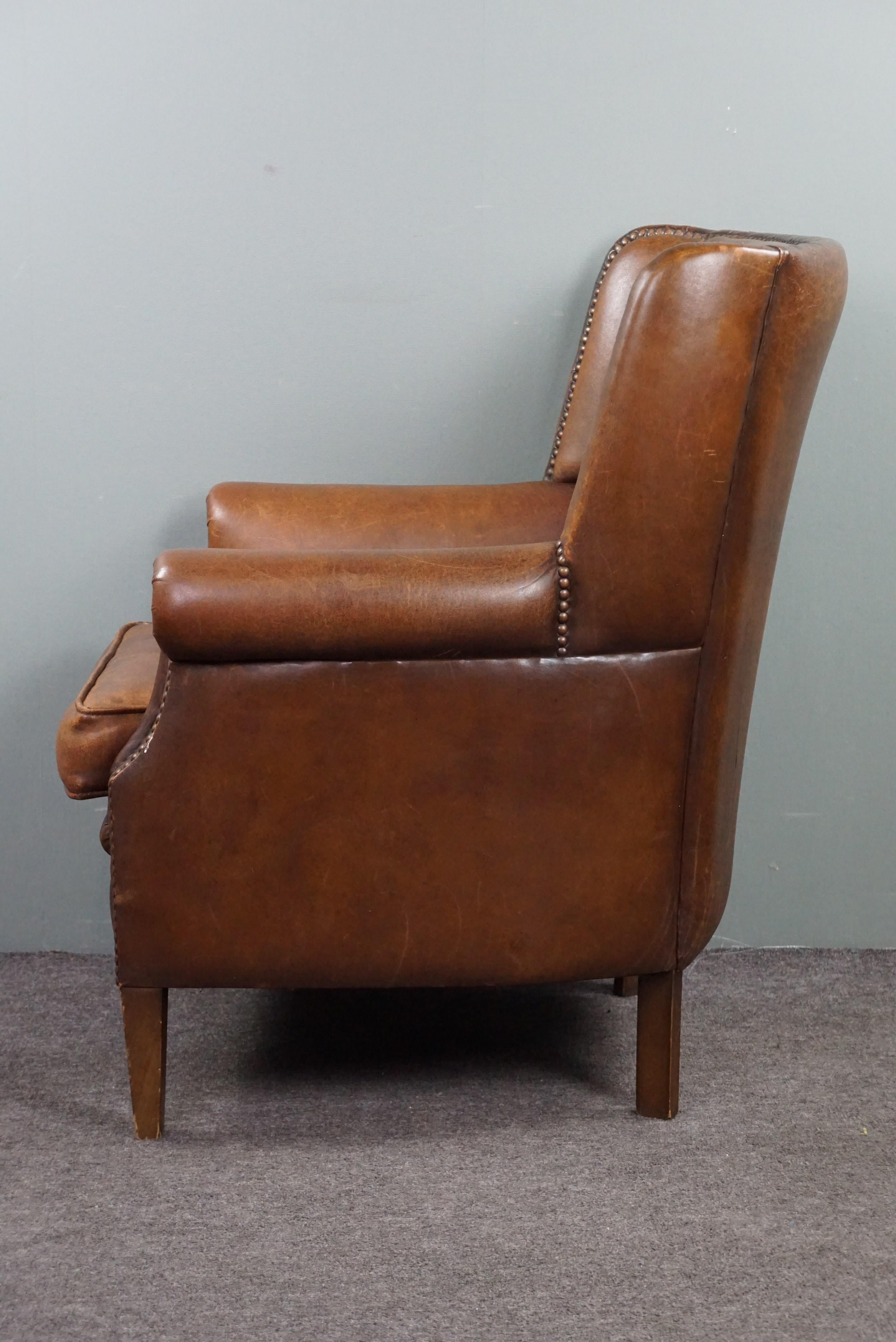 Eye-catching weathered sheep leather wingchair For Sale 1