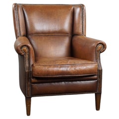 Eye-catching weathered sheep leather wingchair