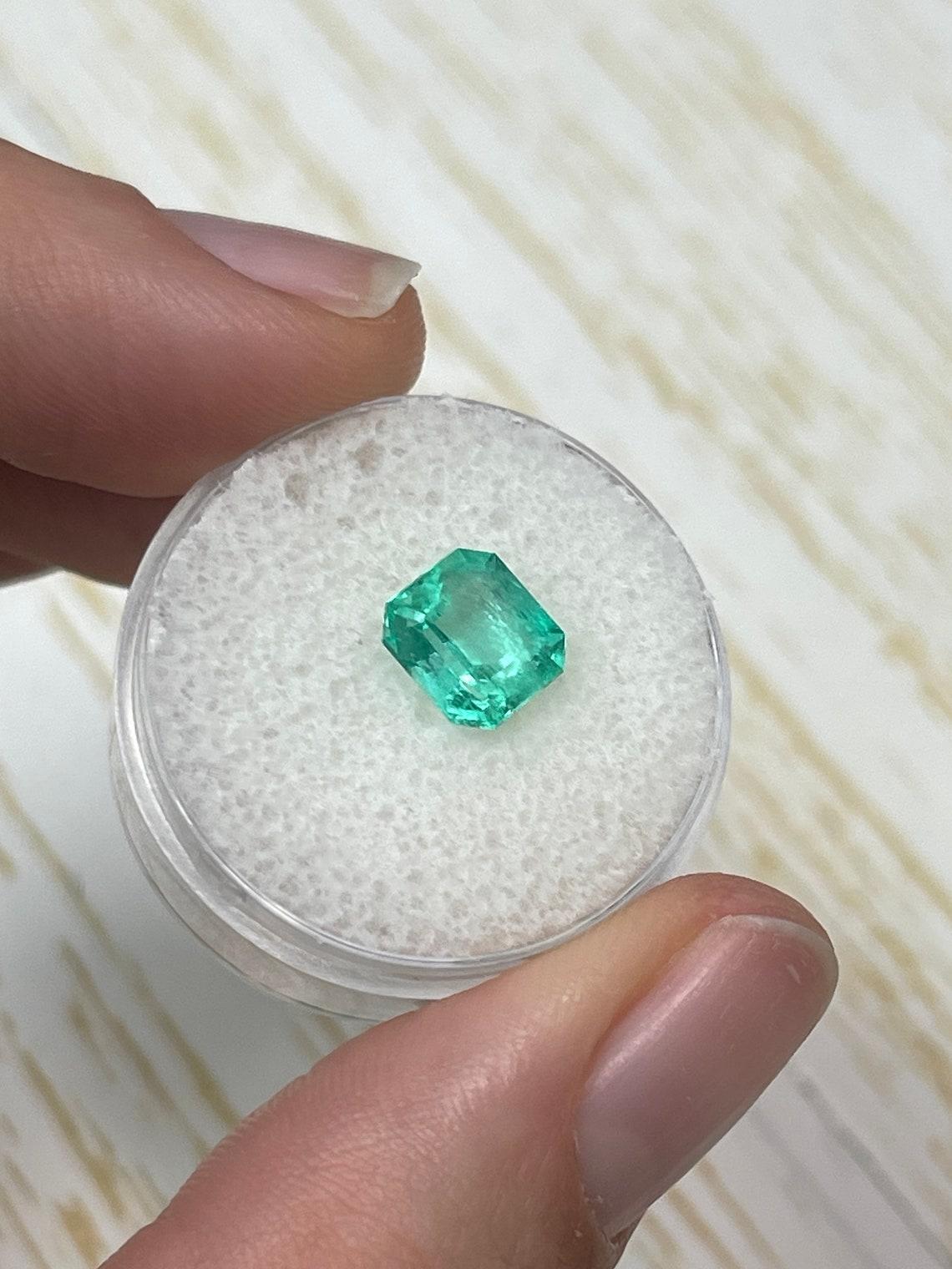Women's Eye Clean 2.03 Carat Bluish Green Emerald Cut Colombian Emerald Gem - May For Sale