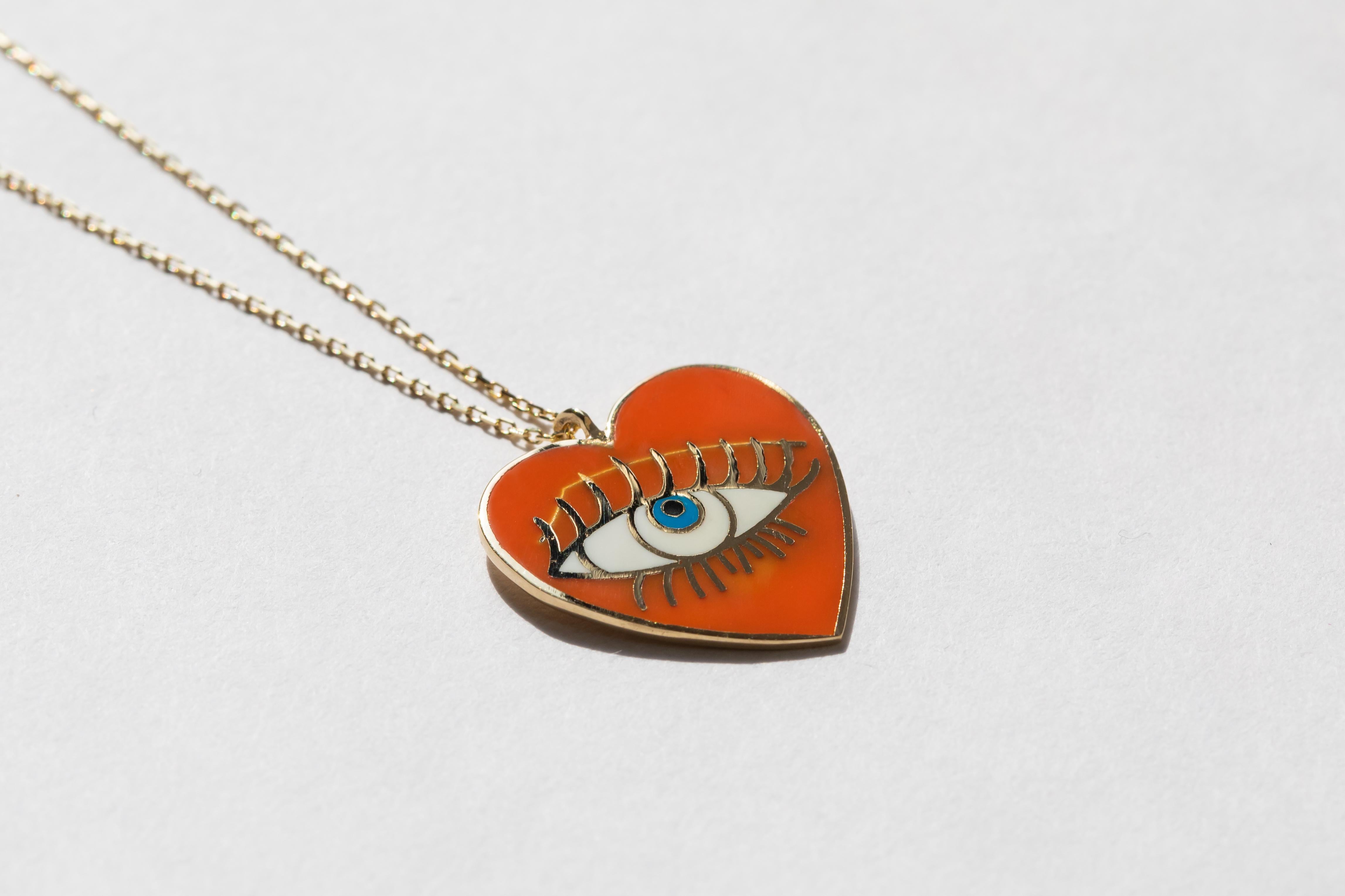heart necklace with pictures inside