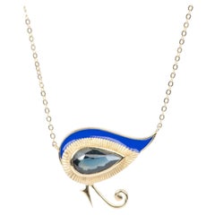 Collier en or 9 carats avec saphir du Nigeria 1,82 carat et émail bleu « Eye of Horus »