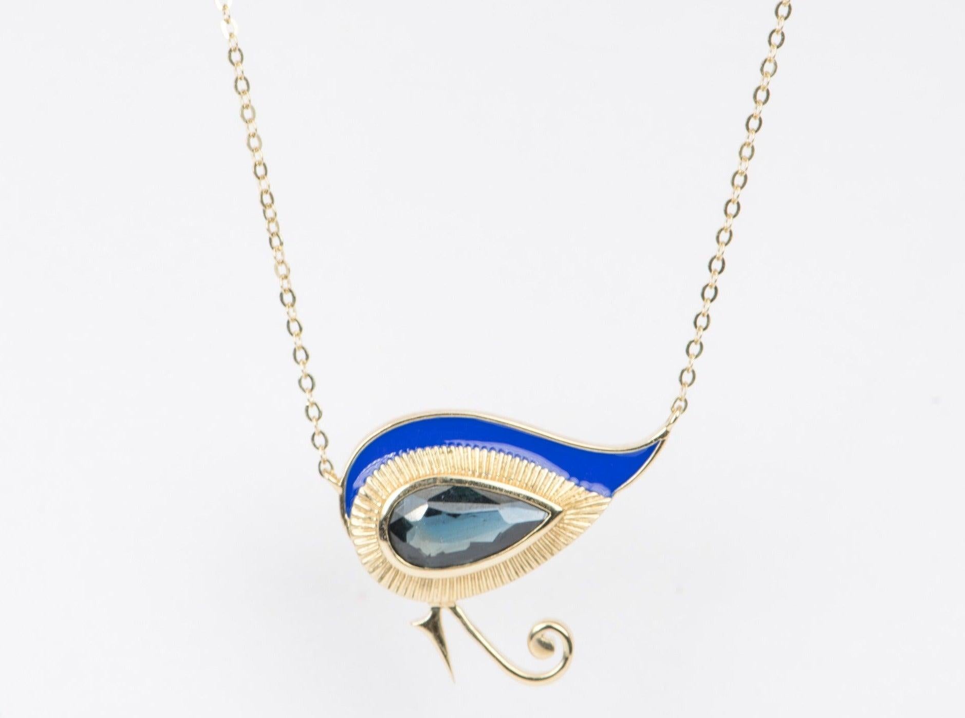 ♥ Eye of Horus Pear Shaped Sapphire 14K Yellow Gold Necklace with bright blue enamel
♥ The item measures 19.2mm in length, 23mm in width, and stands 3.5mm from the finger. The necklace is 17