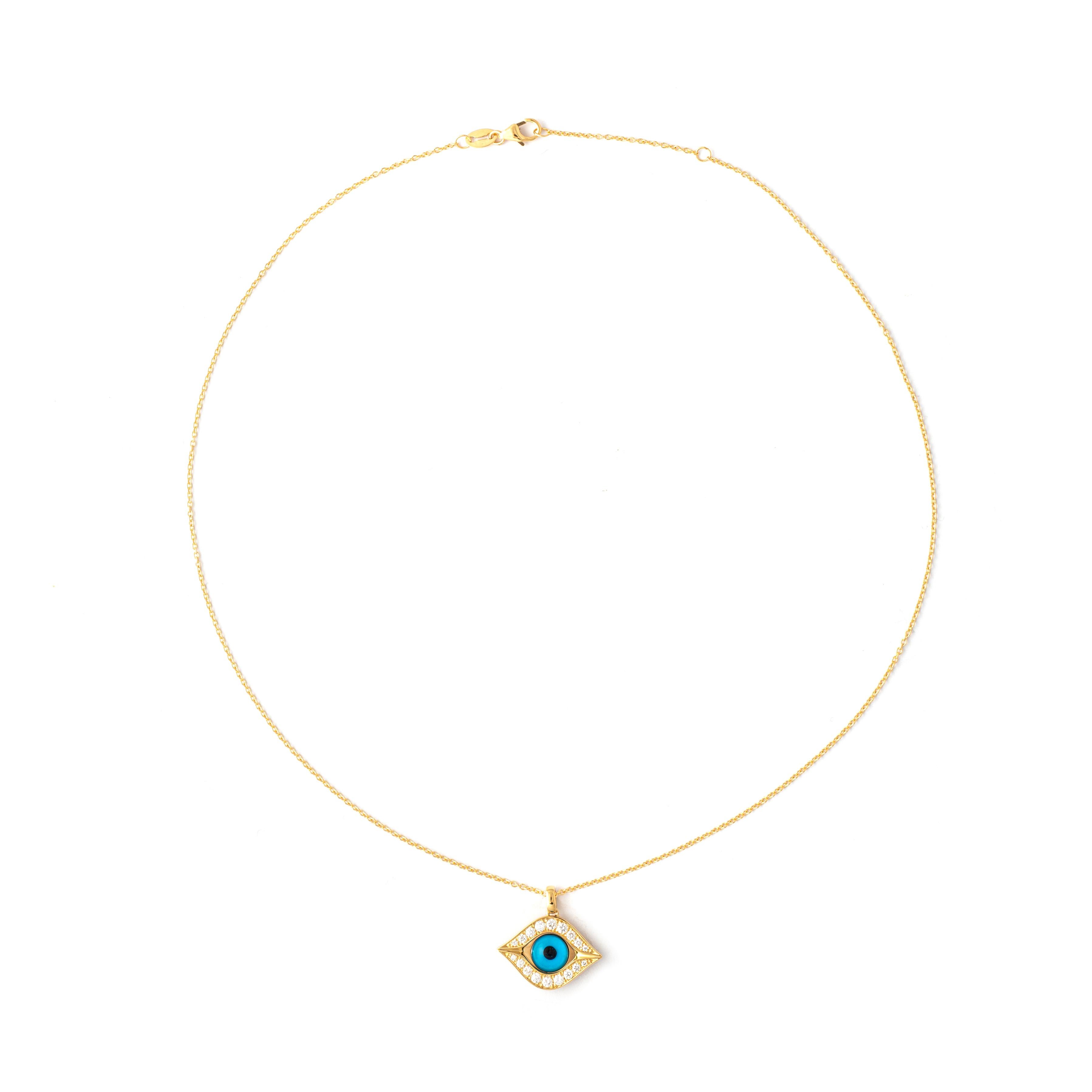 Eye pendant necklace in 18kt yellow gold set with 18 diamonds 0.40 cts.

Length: 41.50 centimeters ( 16.34 inches) up to 44.50 centimeters (17.52 inches).

Pendant length : 2.00 centimeters ( 0.79 inches).

Total weight: 5.51 grams. 
