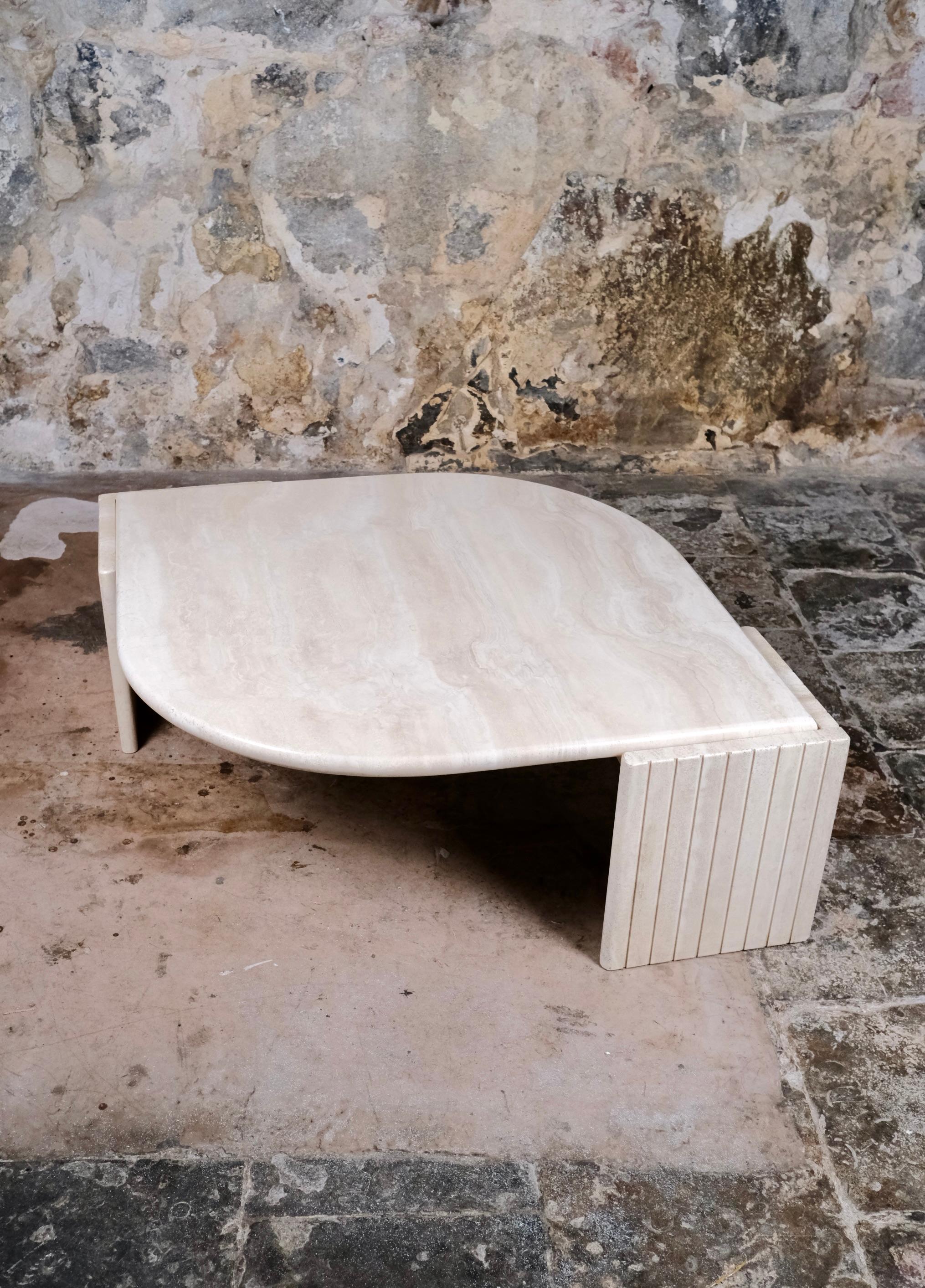 French Eye-shaped travertine coffee table by Roche Bobois, France, 1980s For Sale