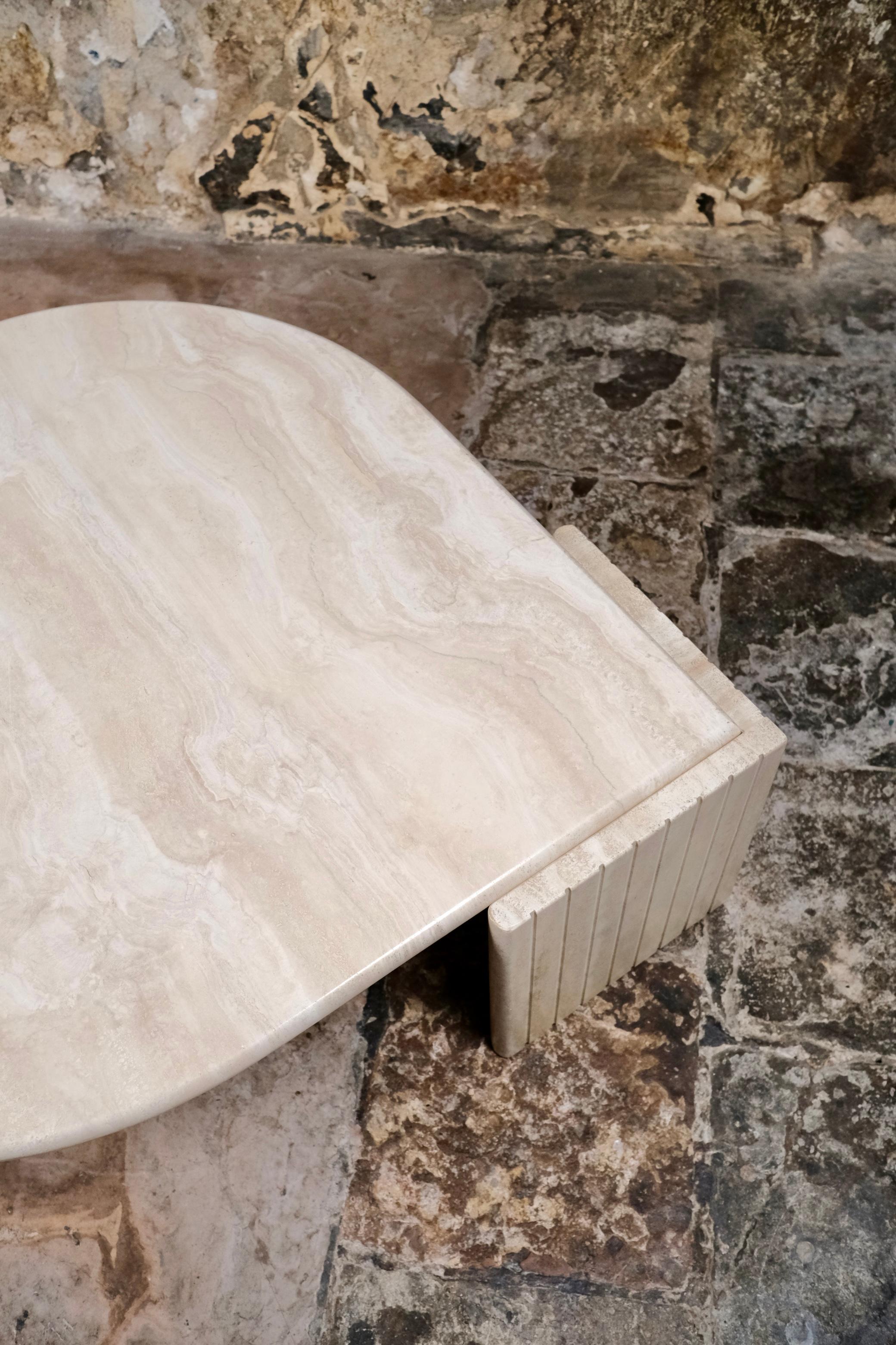 Travertine Eye-shaped travertine coffee table by Roche Bobois, France, 1980s For Sale