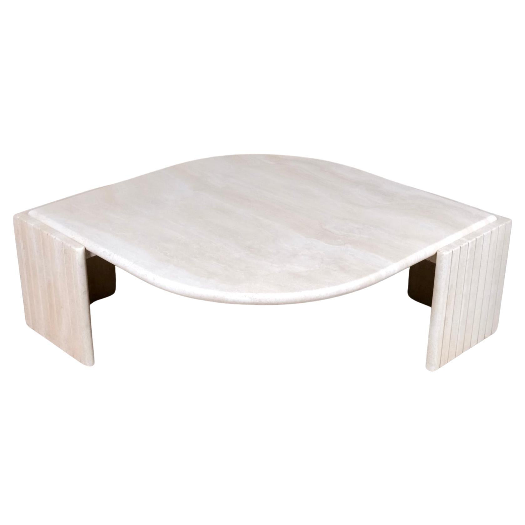 Eye-shaped travertine coffee table by Roche Bobois, France, 1980s For Sale