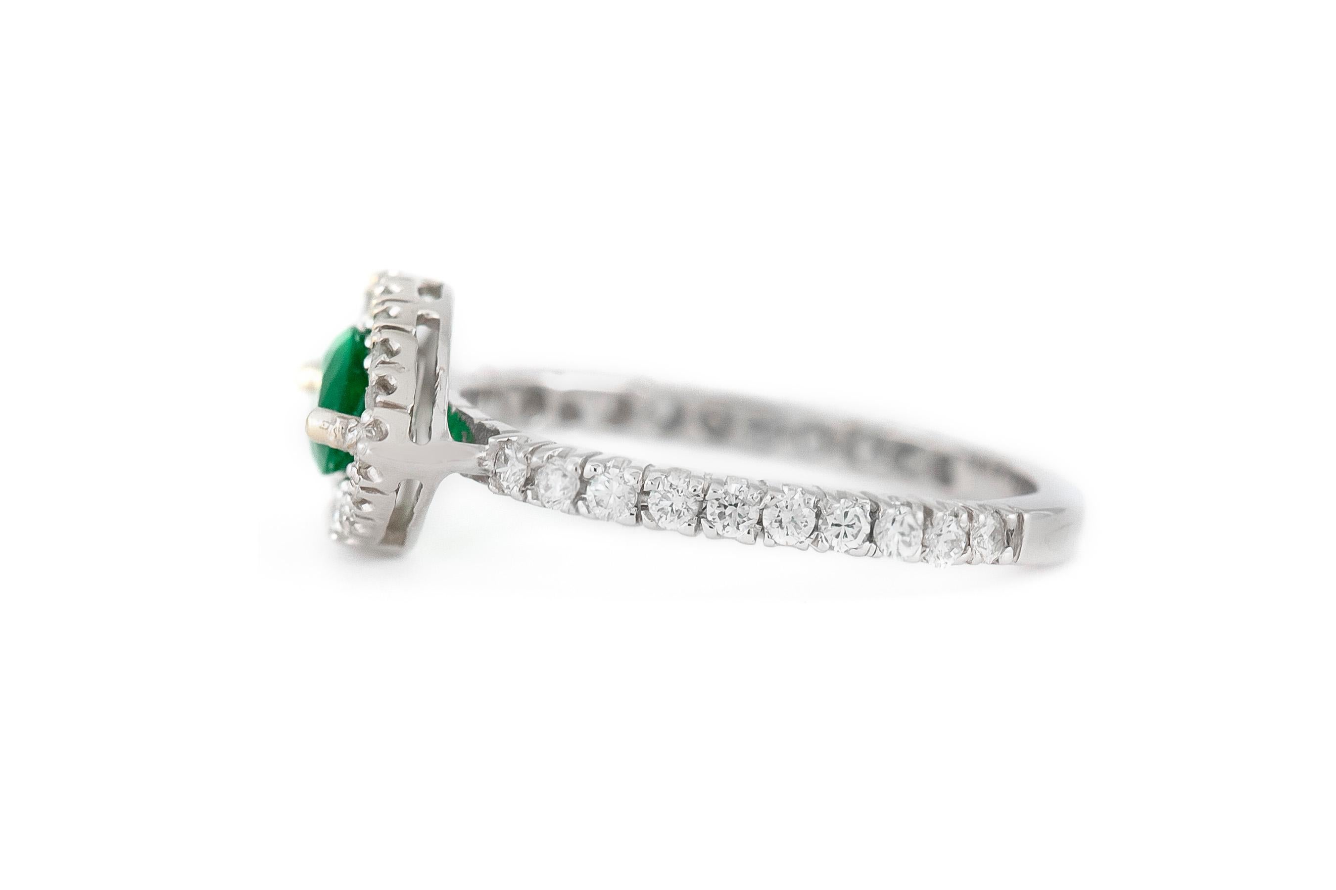 The ring is finely crafted in 18k white gold with center stone emerald weighing approximately total of 0.53 carat and diamonds weighing approximately total of 0.48 carat.
Circa 2000.
