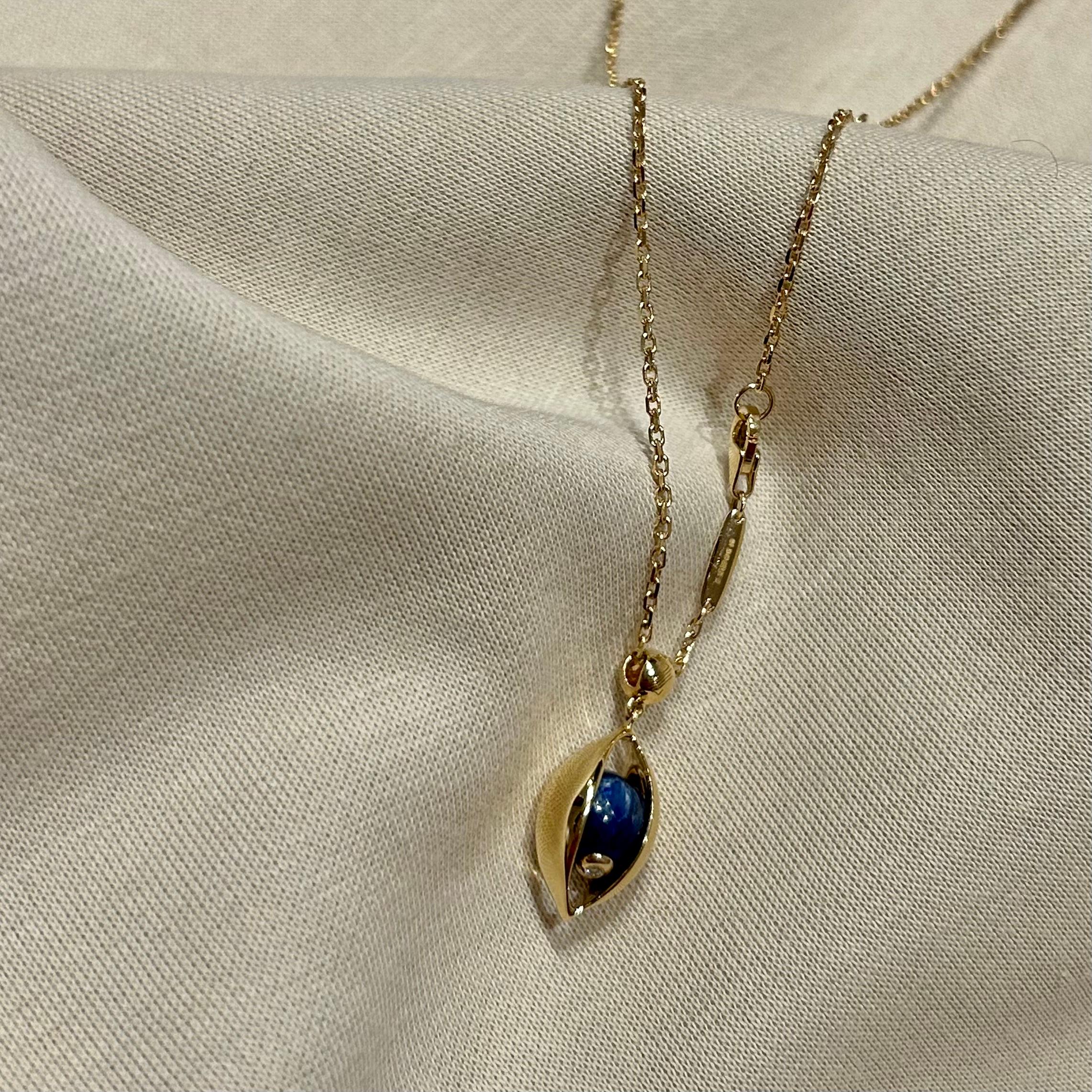 Brilliant Cut Eye Unisex Small Pendant Necklace 18 Karat Yellow Gold Blue Kyanite Ruby Diamond For Sale