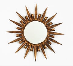Eyelash Sunburst Mirror in Gilt Wrought Iron, France 1950s