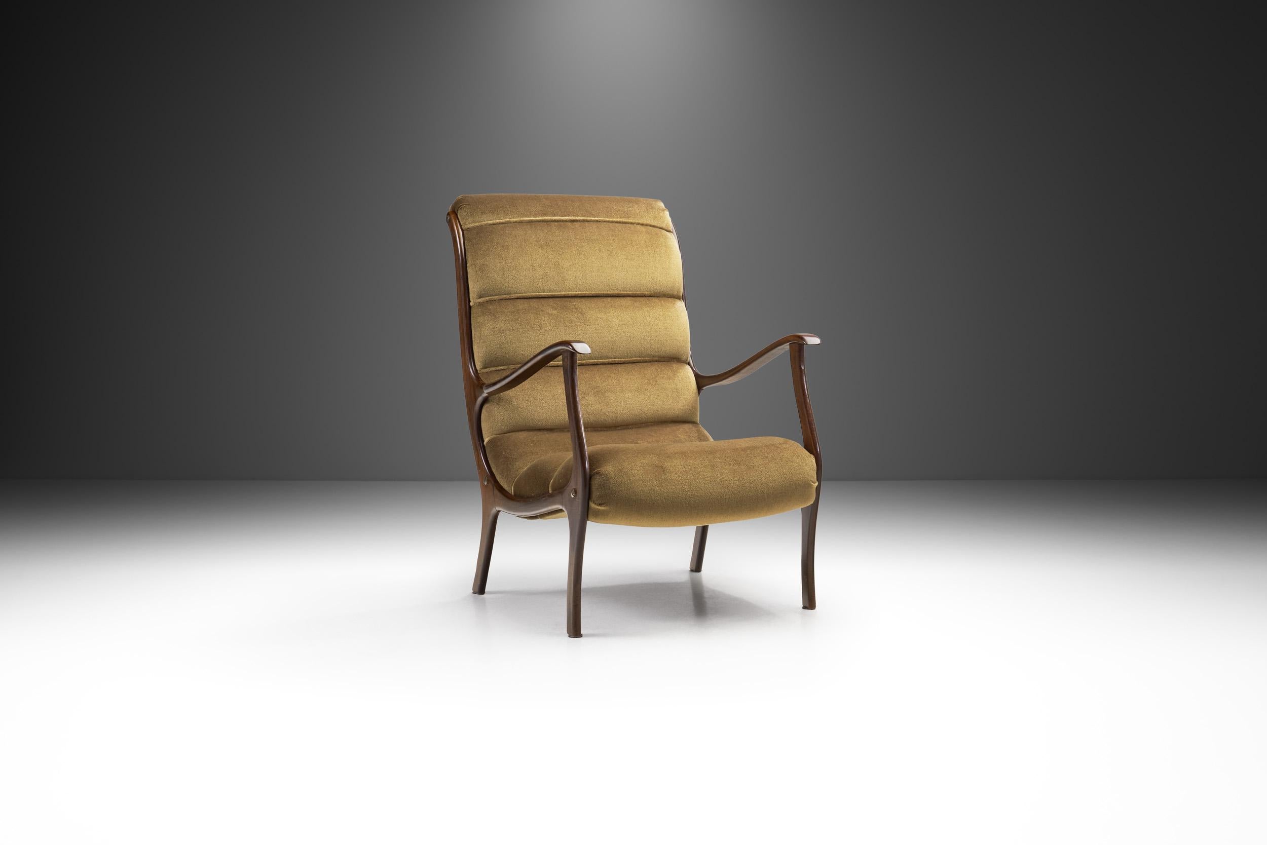 Like the 1958 Mitzi armchair, this model belongs to the most well-known chair designs of Italian designer, Ezio Longhi. This lounge chair takes one back to post-war Italy, when the now world-famous free form designs of the 1950s and 60s started
